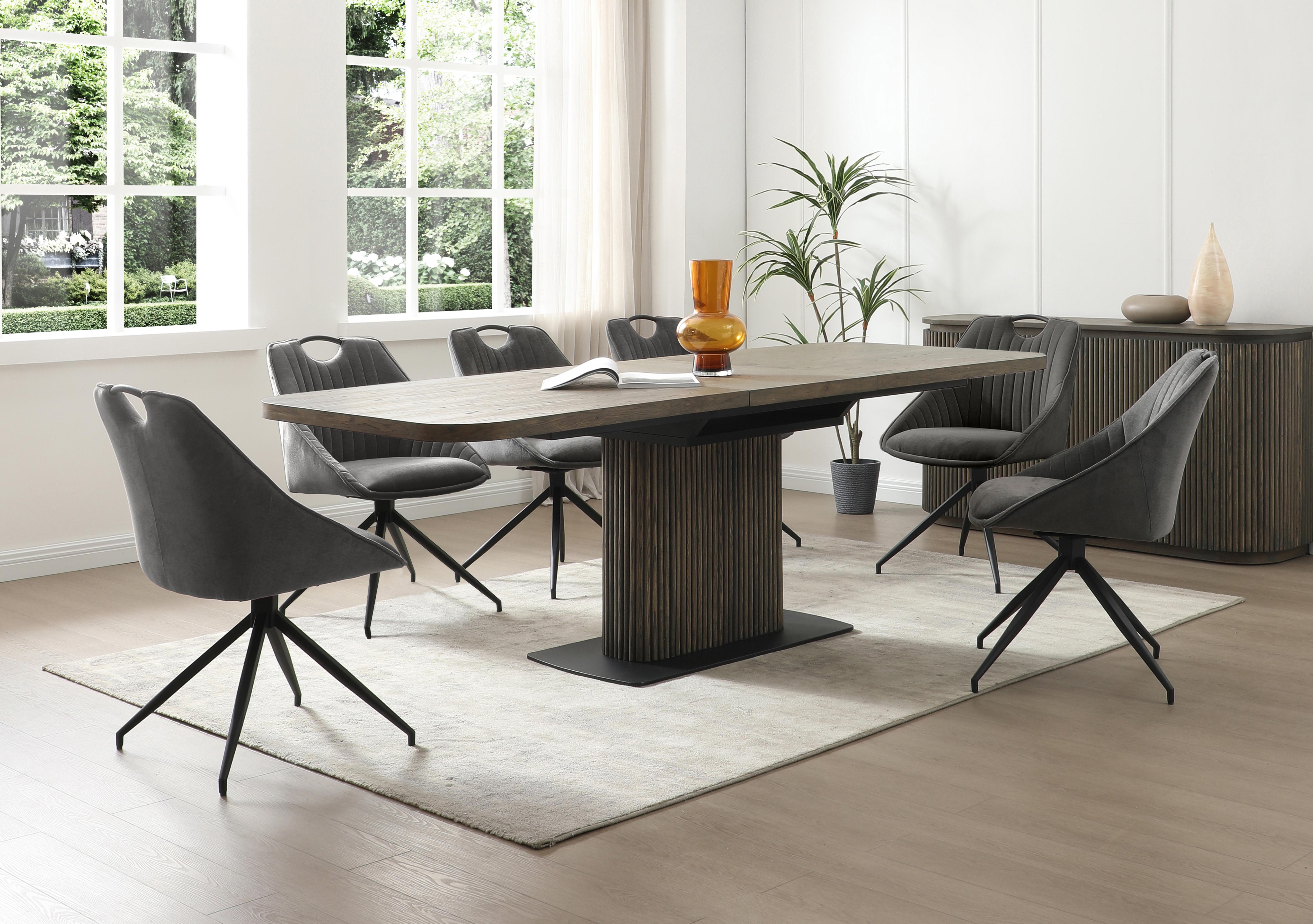 Jai Large Extending Dining Table with 6 Swivel Dining Chairs in  on Furniture Village