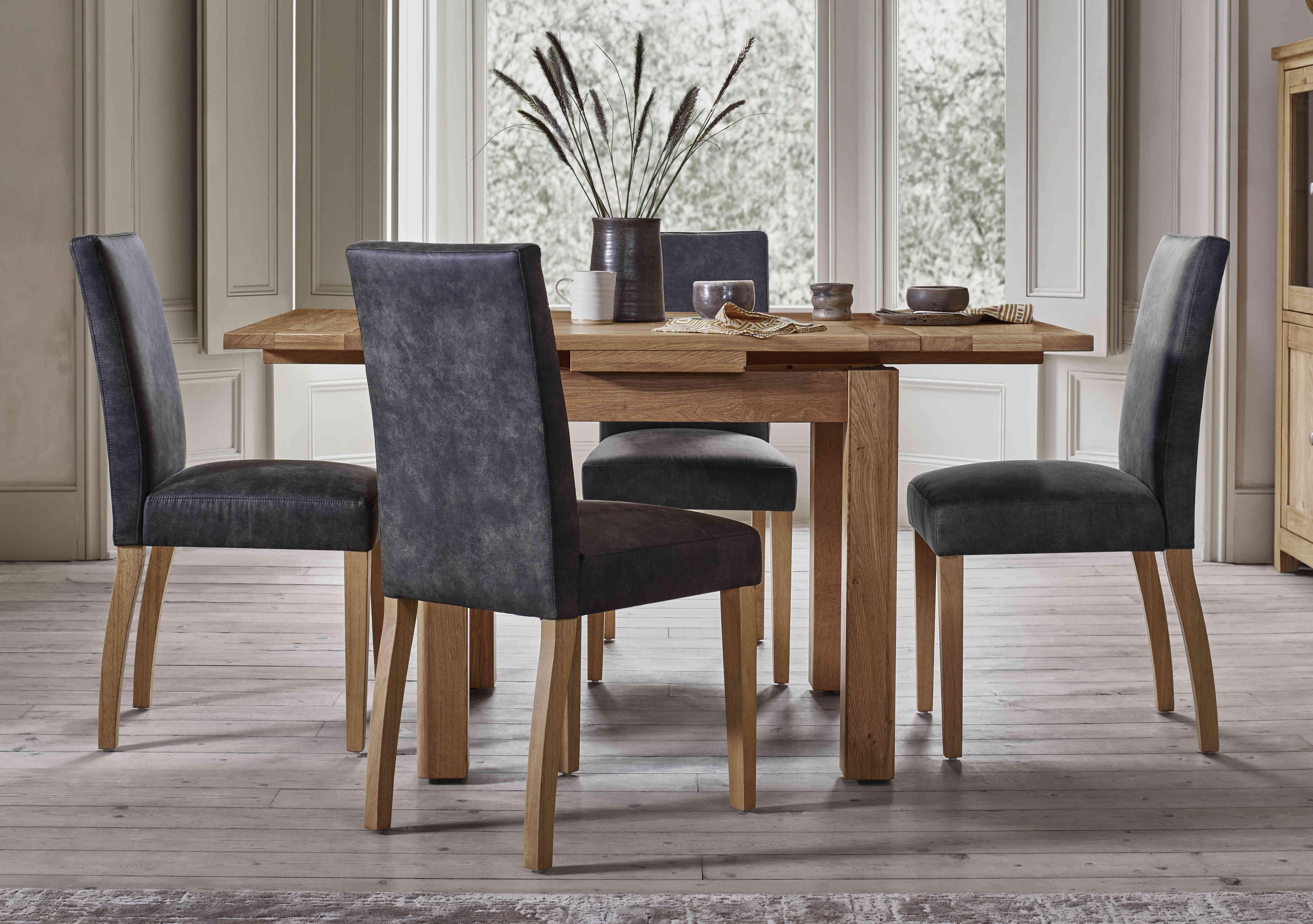 Augusta Draw Leaf Extending Dining Table and 4 Cowboy Upholstered Dining Chairs in  on Furniture Village