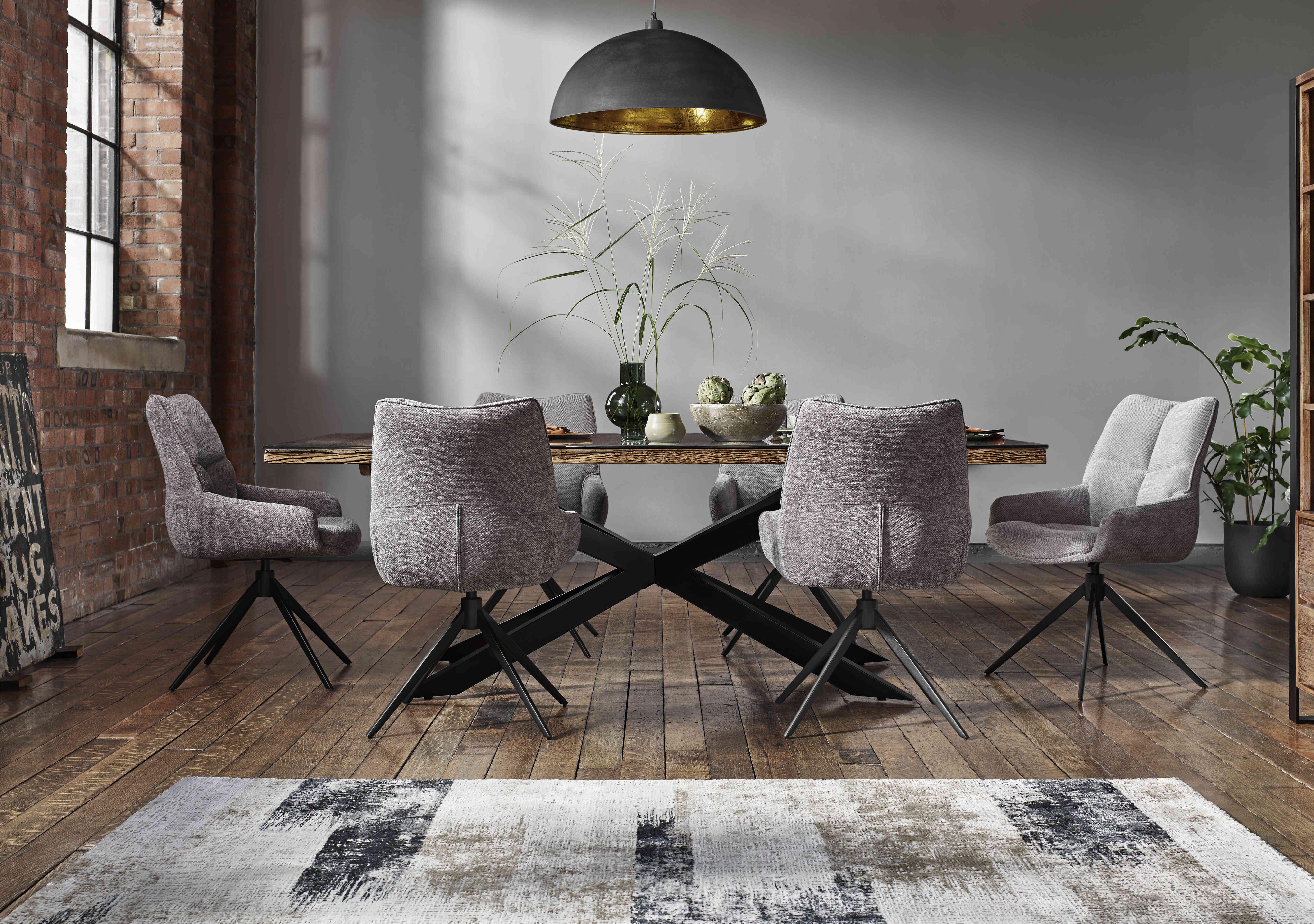 Kiara Large Rectangular Dining Table with Black Legs and 6 Swivel Fabric Dining Chairs in  on Furniture Village