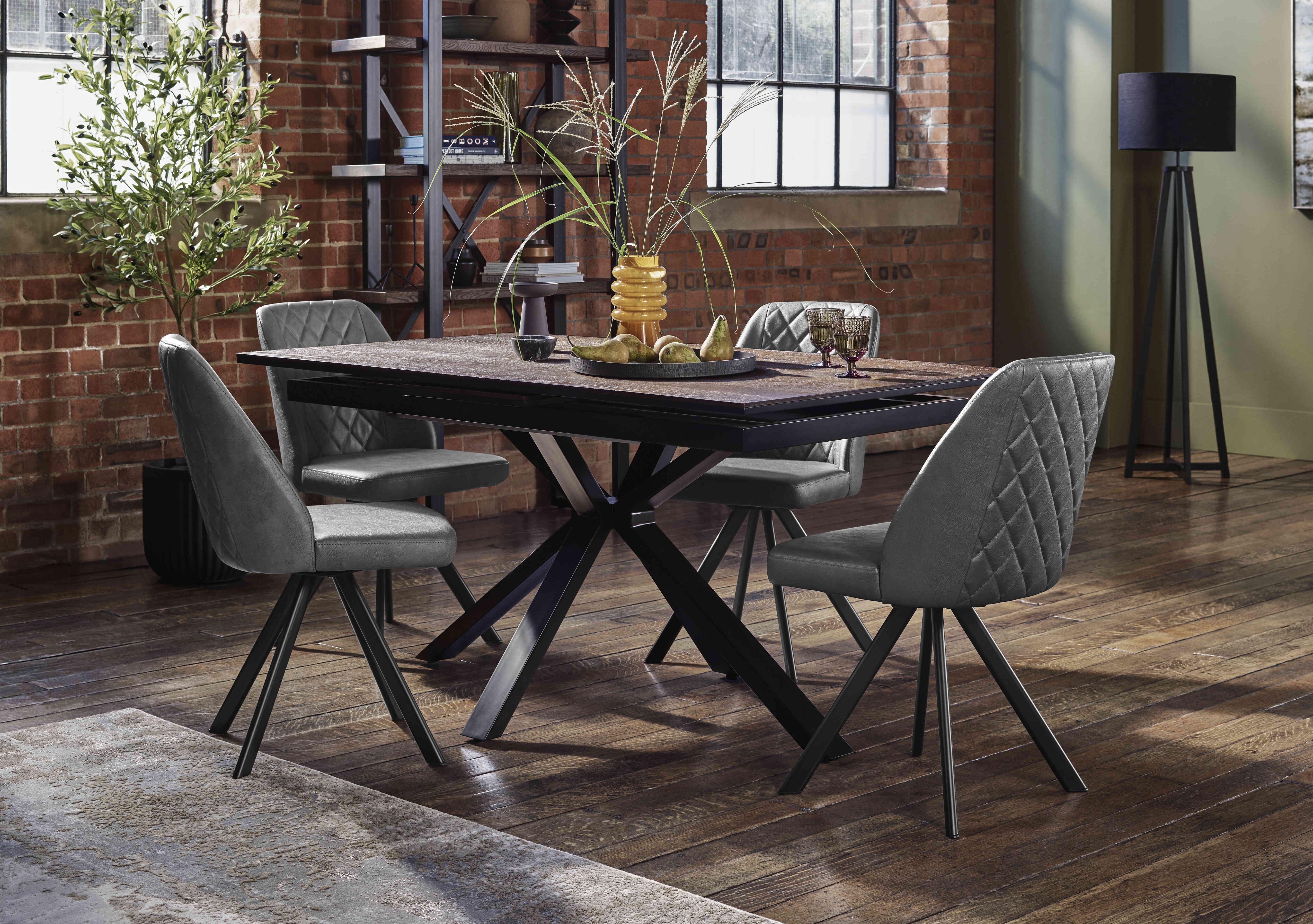 Mars Pop-up Dining Table with 4 Faux Leather Swivel Dining Chairs in  on Furniture Village