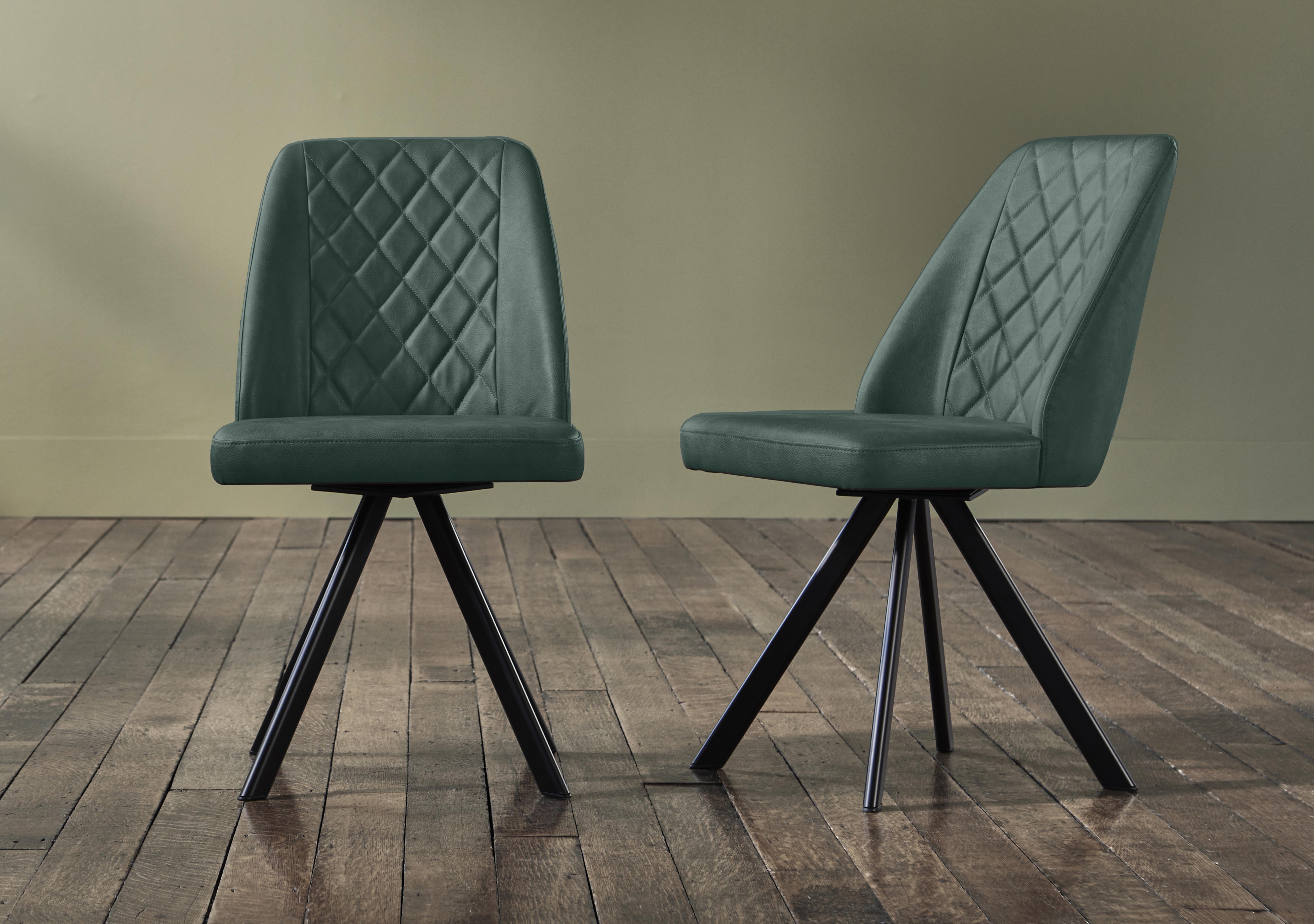 Mars Pair of Faux Leather Swivel Dining Chairs in Green on Furniture Village