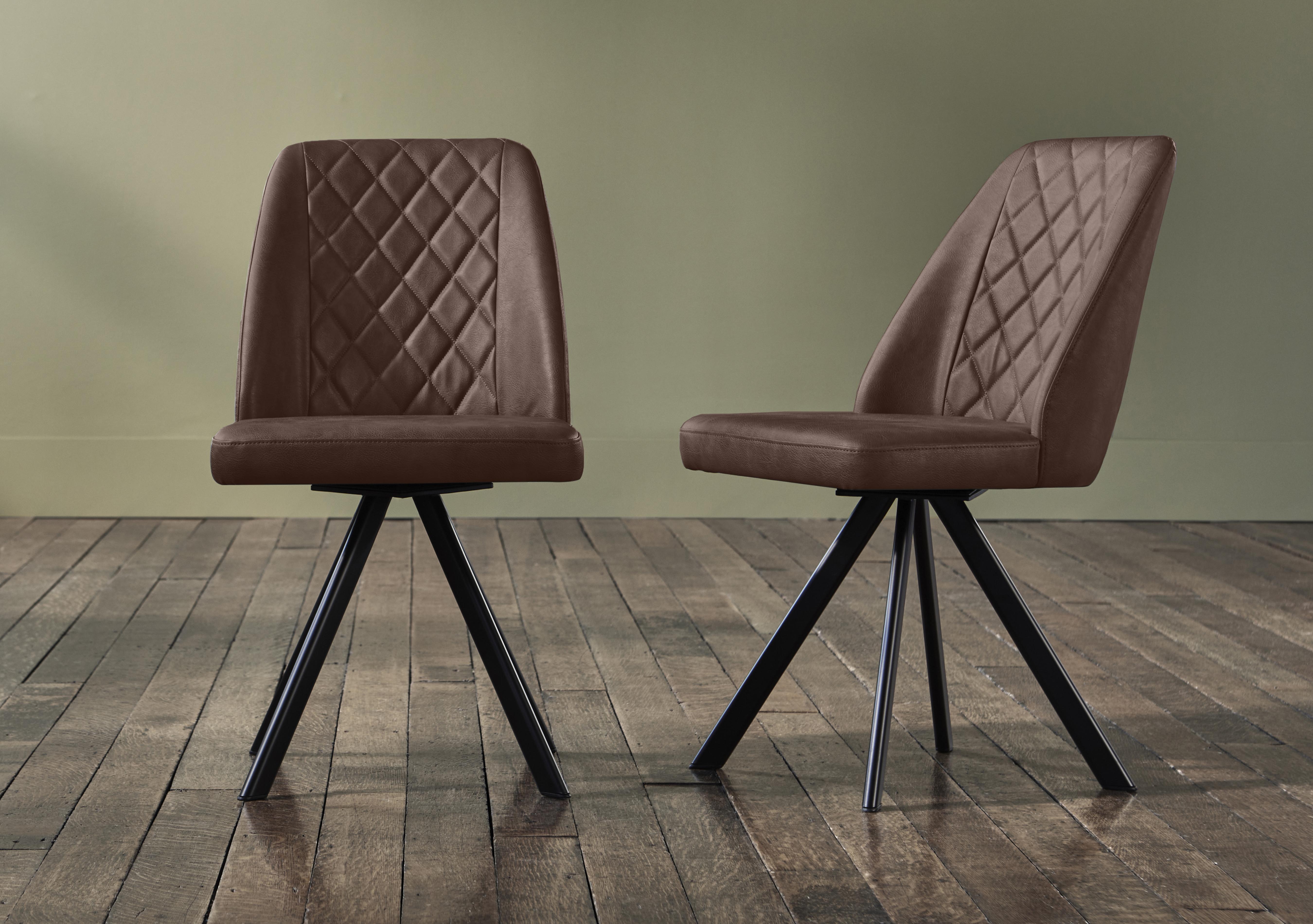 Mars Pair of Faux Leather Swivel Dining Chairs in Tan on Furniture Village