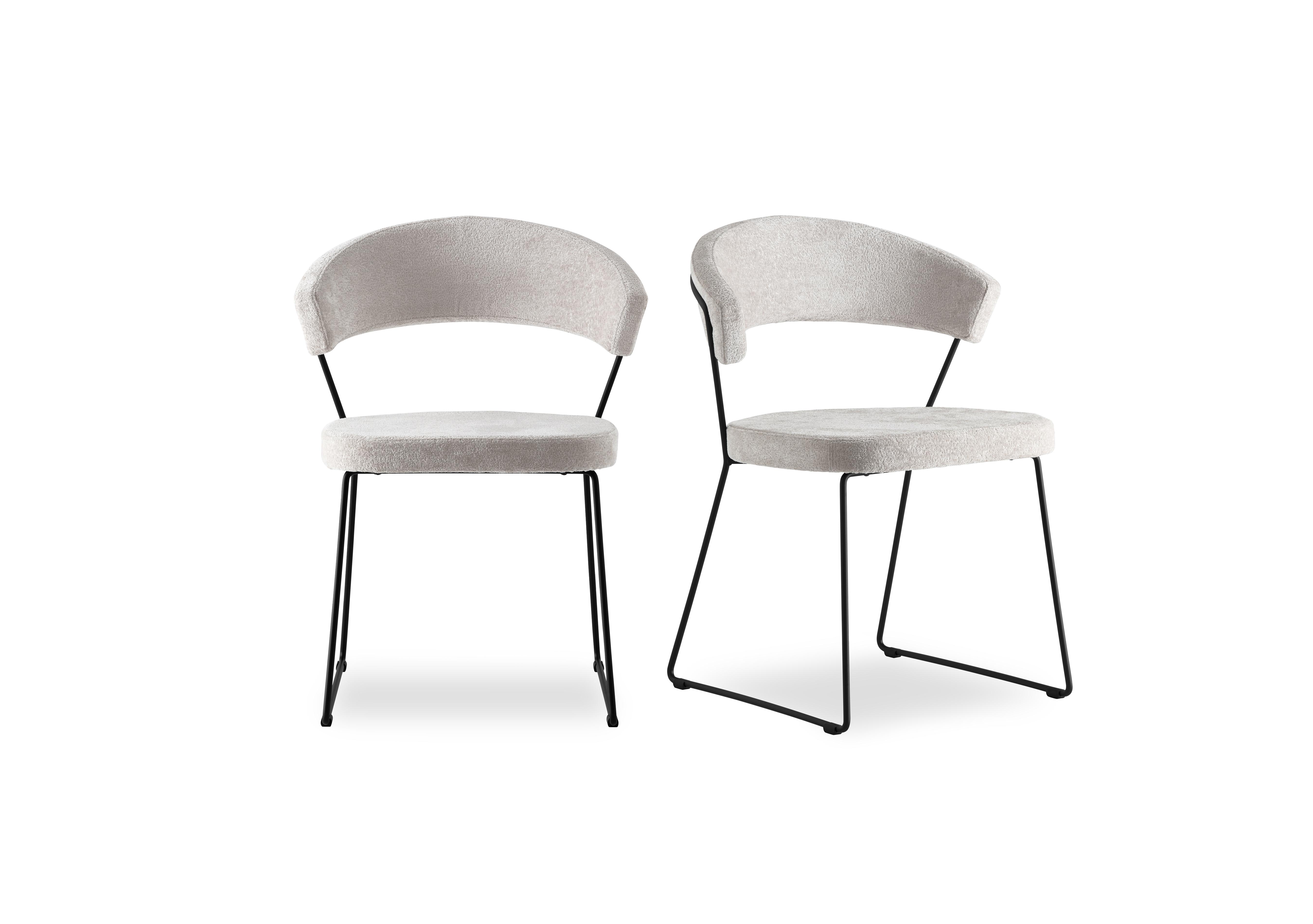 New York Pair of Black Metal Leg Dining Chairs in Syt -Enyl Sand on Furniture Village