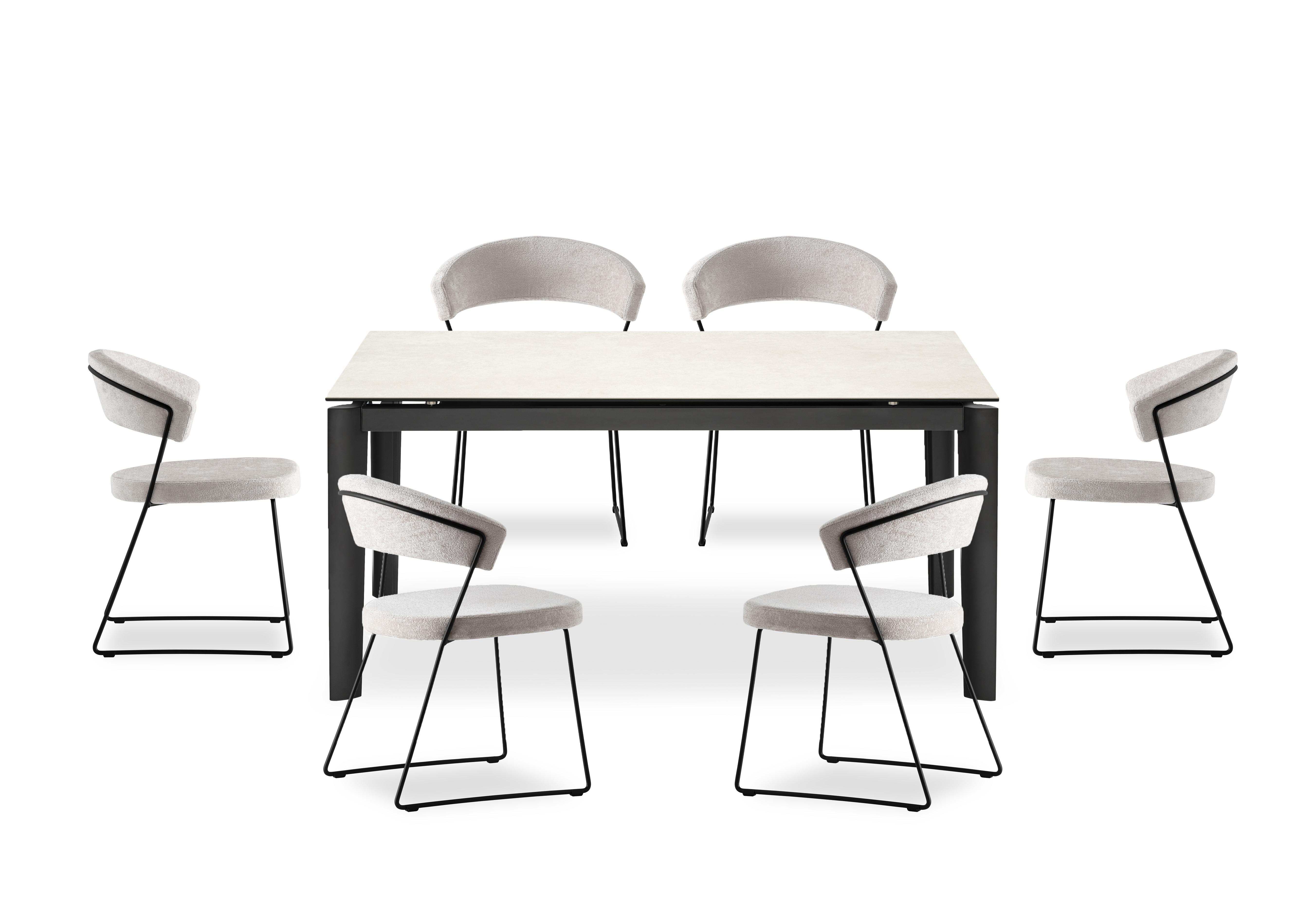 Rosa 160cm Medium Extending Dining Table with Salt White Ceramic Top and Black Metal Legs and 6 New York Dining Chairs in Syt -Enyl Sand on Furniture Village