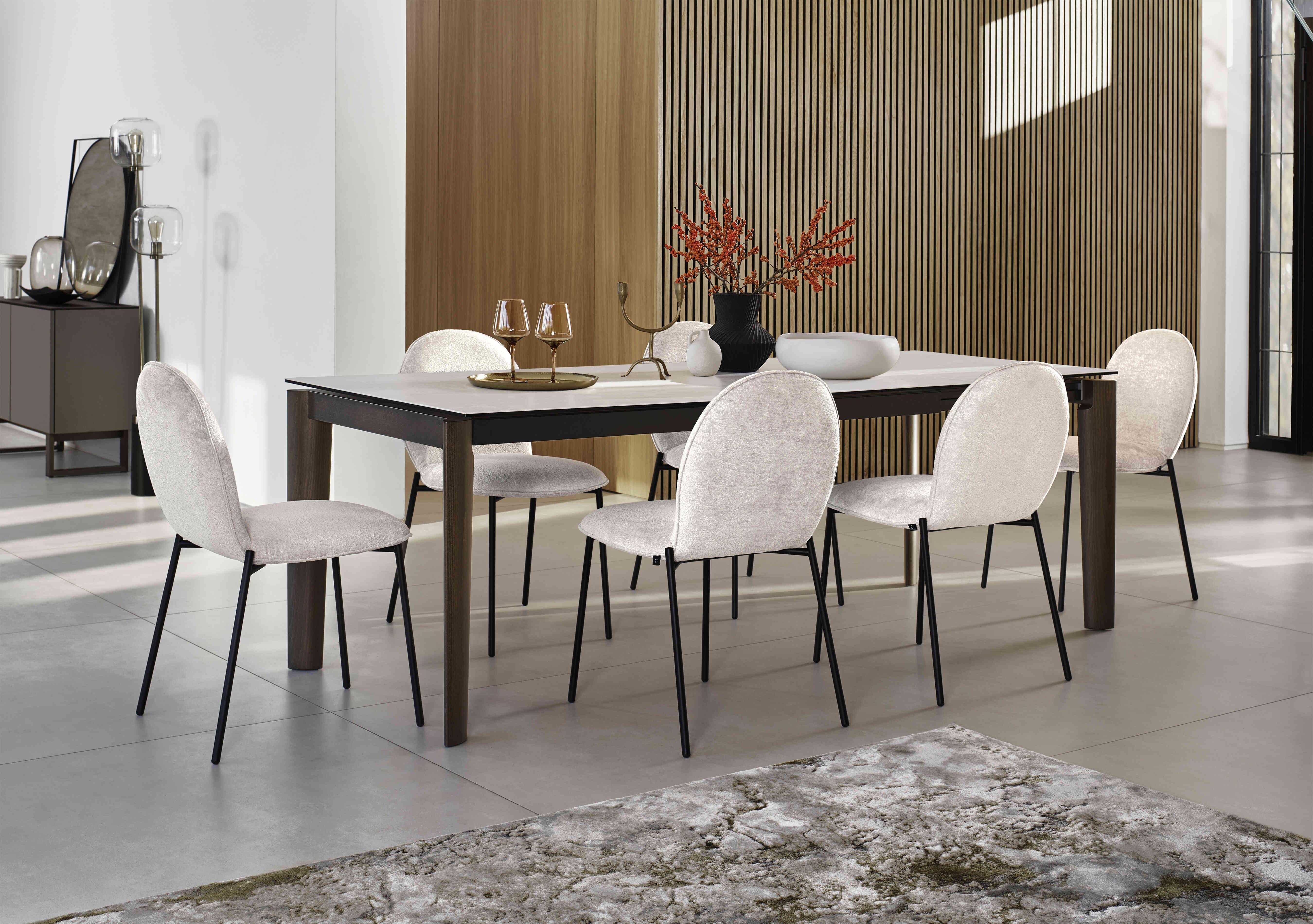 Rosa 160cm Medium Extending Dining Table with Salt White Ceramic Top and Black Metal Legs and 6 Riley Dining Chairs in  on Furniture Village