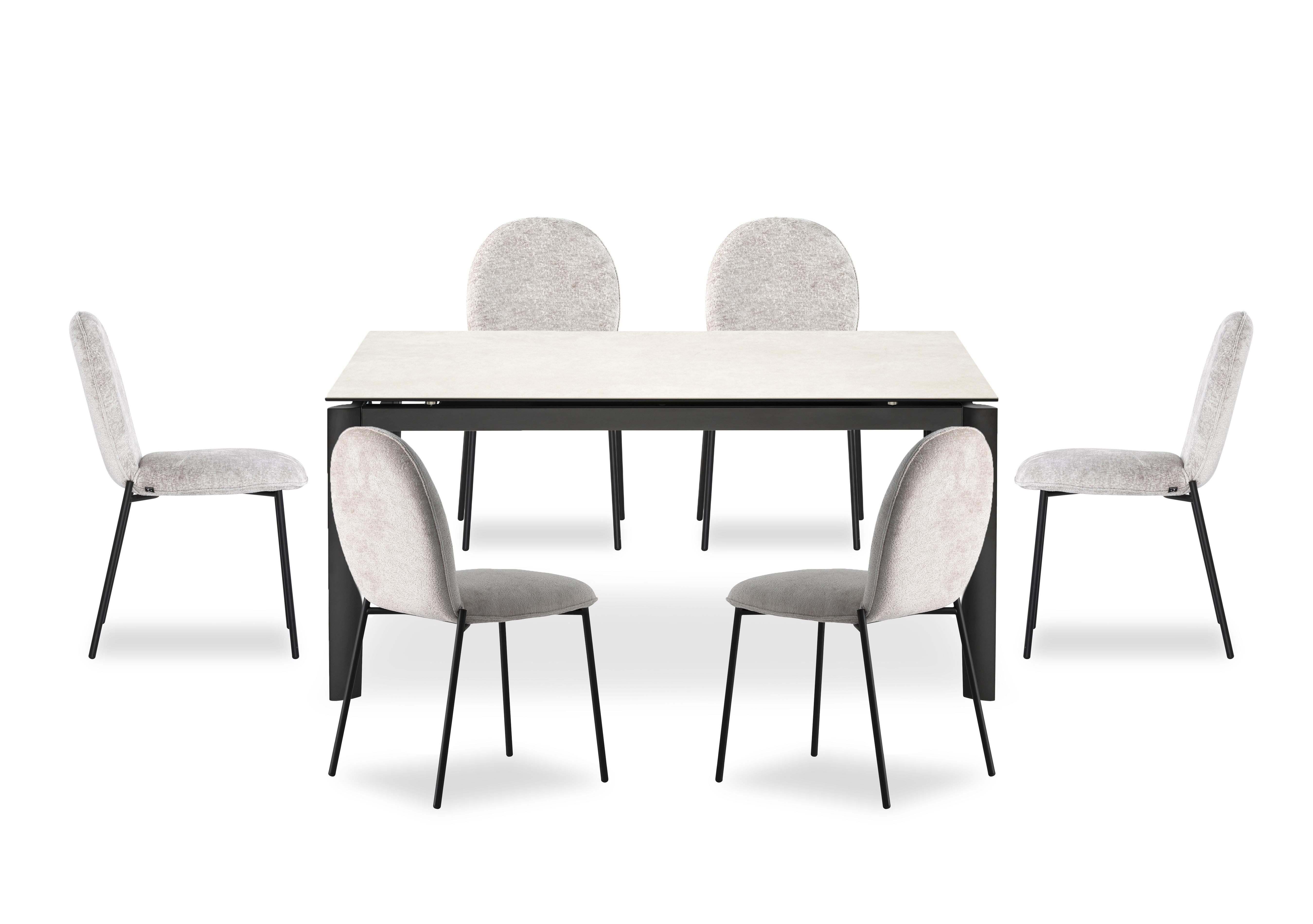 Rosa 160cm Medium Extending Dining Table with Salt White Ceramic Top and Black Metal Legs and 6 Riley Dining Chairs in Syt -Enyl Sand on Furniture Village