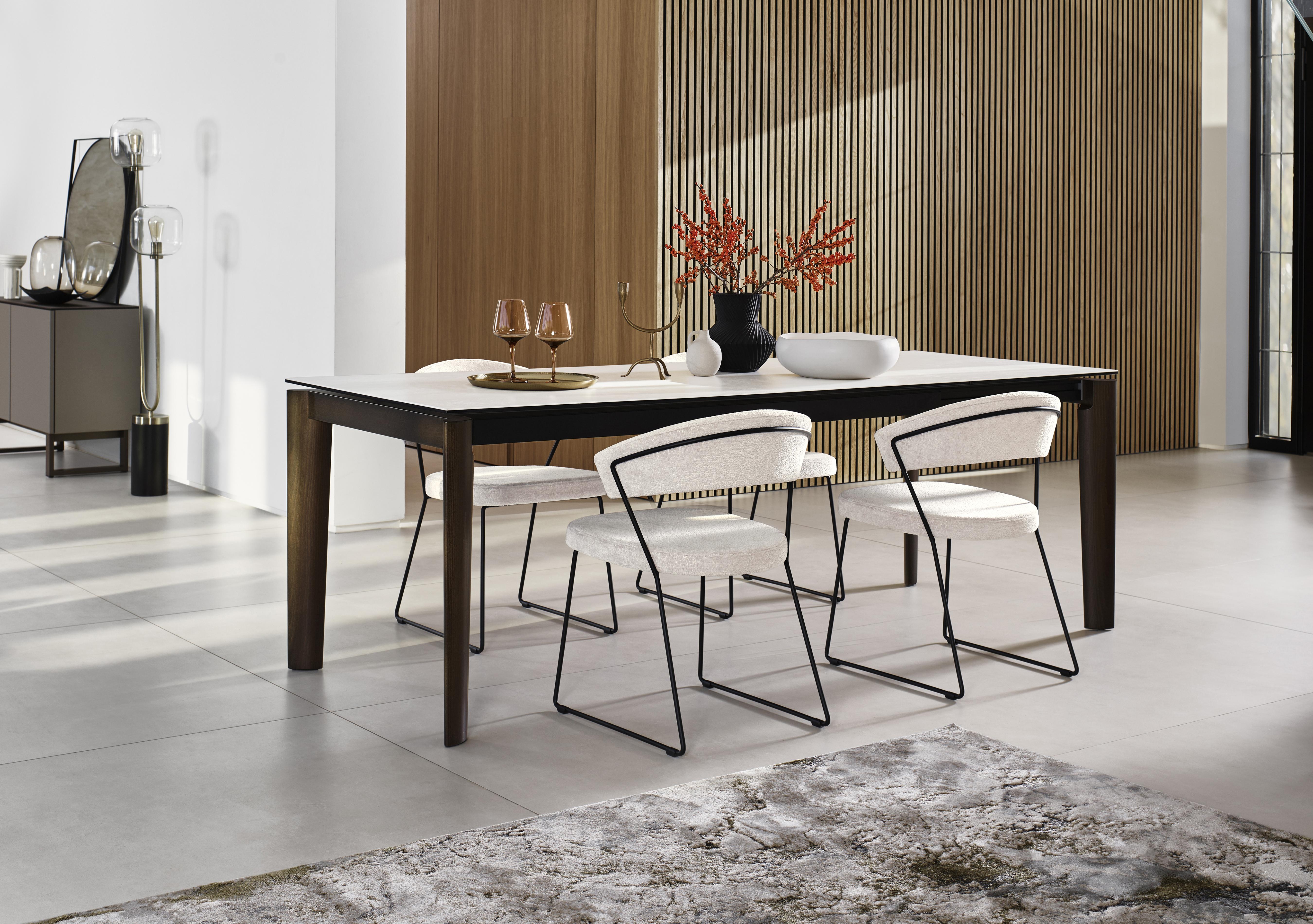 Rosa 160cm Medium Extending Dining Table with Salt White Ceramic Top and Black Metal Legs and 4 New York Dining Chairs in  on Furniture Village