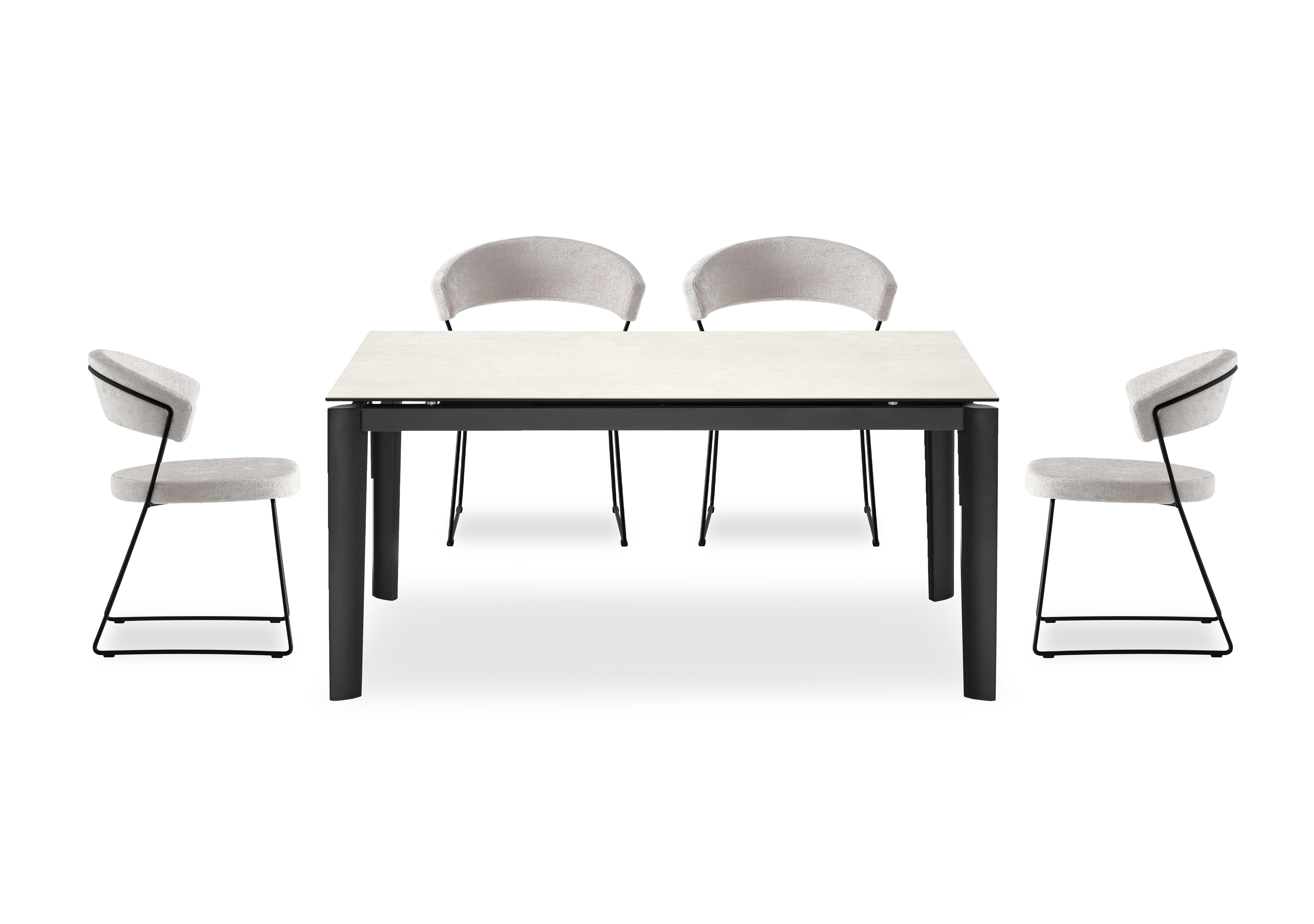 Rosa 160cm Medium Extending Dining Table with Salt White Ceramic Top and Black Metal Legs and 4 New York Dining Chairs in Syt -Enil Sand on Furniture Village