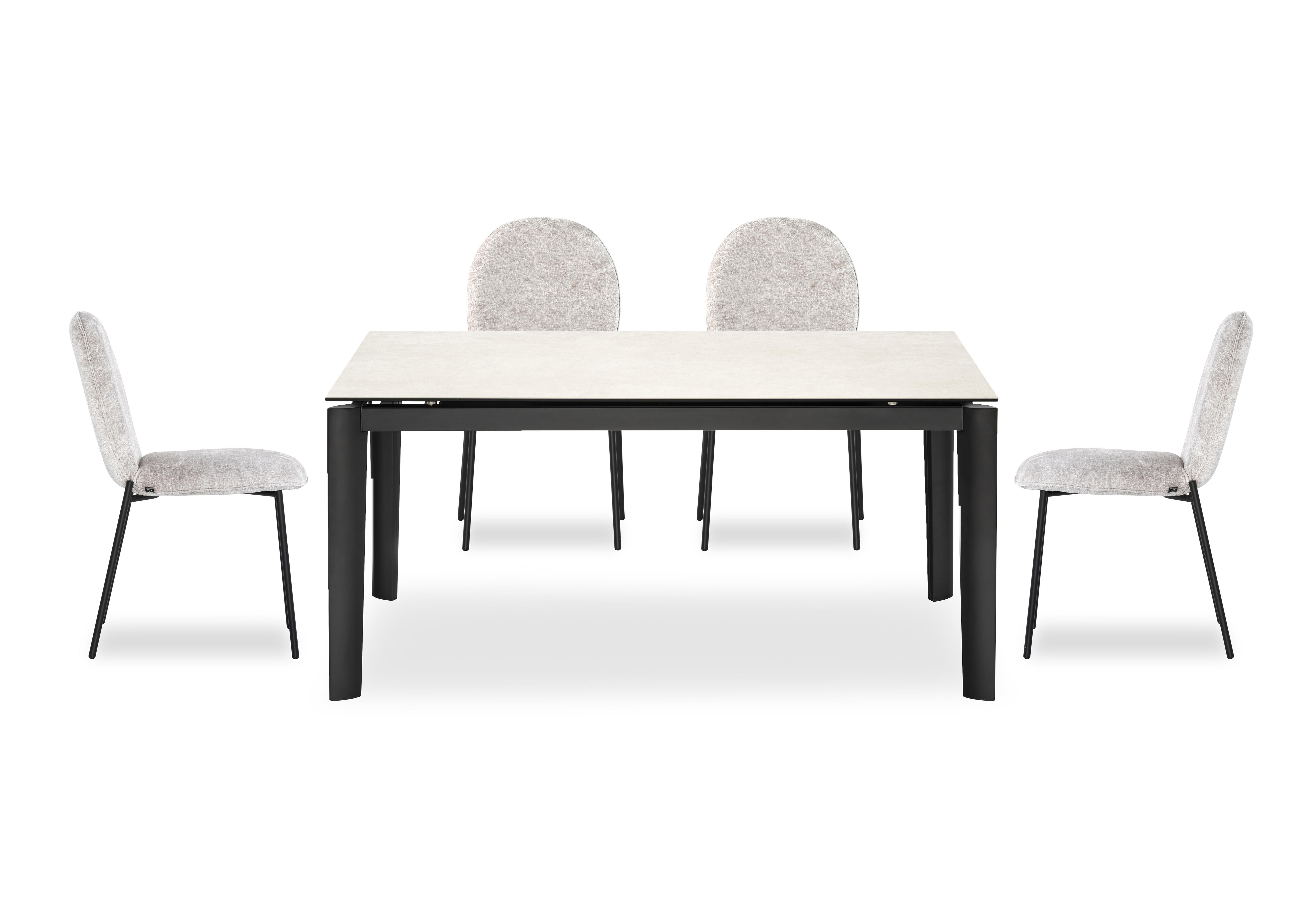 Rosa 160cm Medium Extending Dining Table with Salt White Ceramic Top and Black Metal Legs and 4 Riley Dining Chairs in Syt -Enyl Sand on Furniture Village