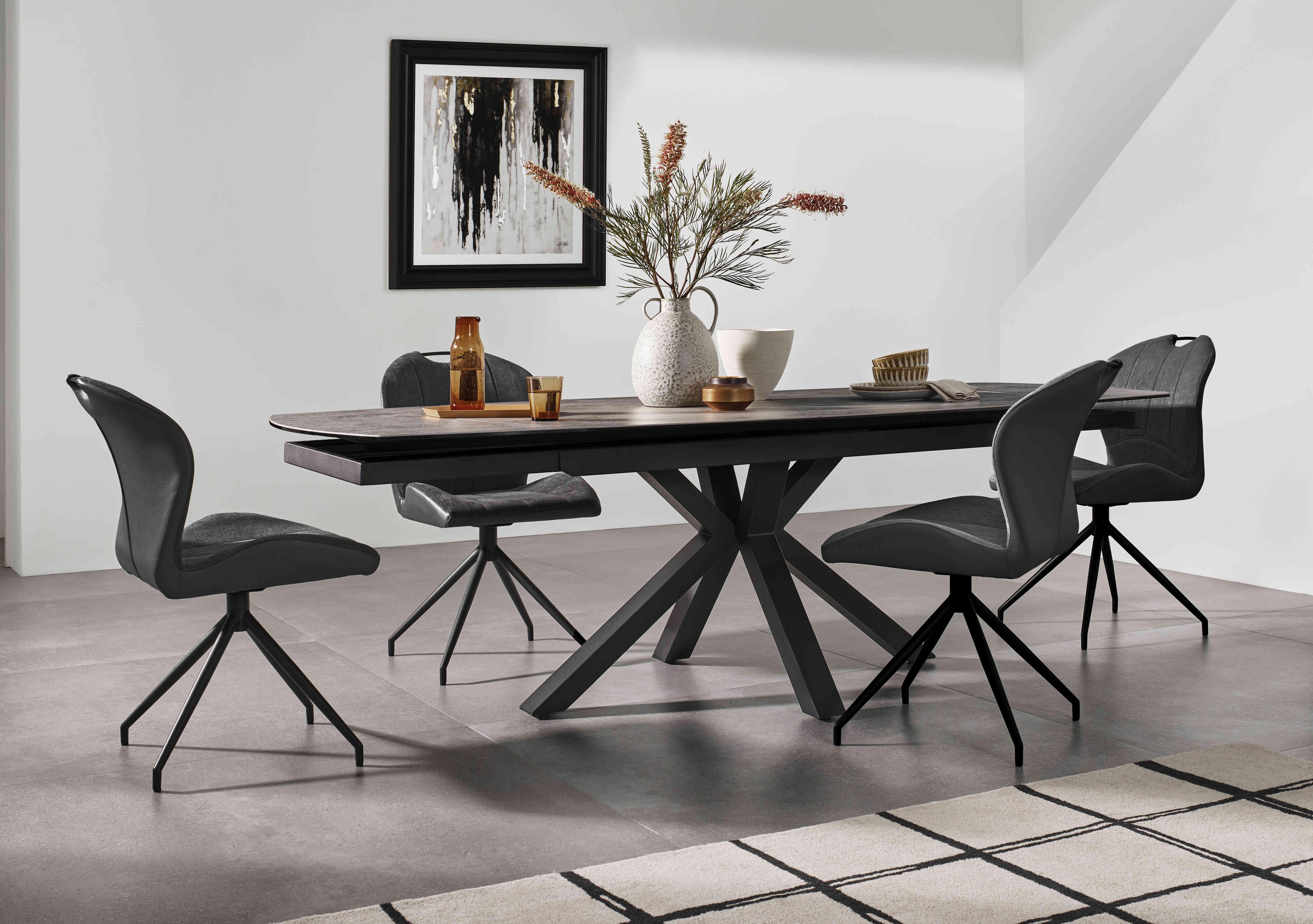 Raul 160cm Silver Swivel Extending Dining Table and 4 Swivel Dining Chairs in  on Furniture Village