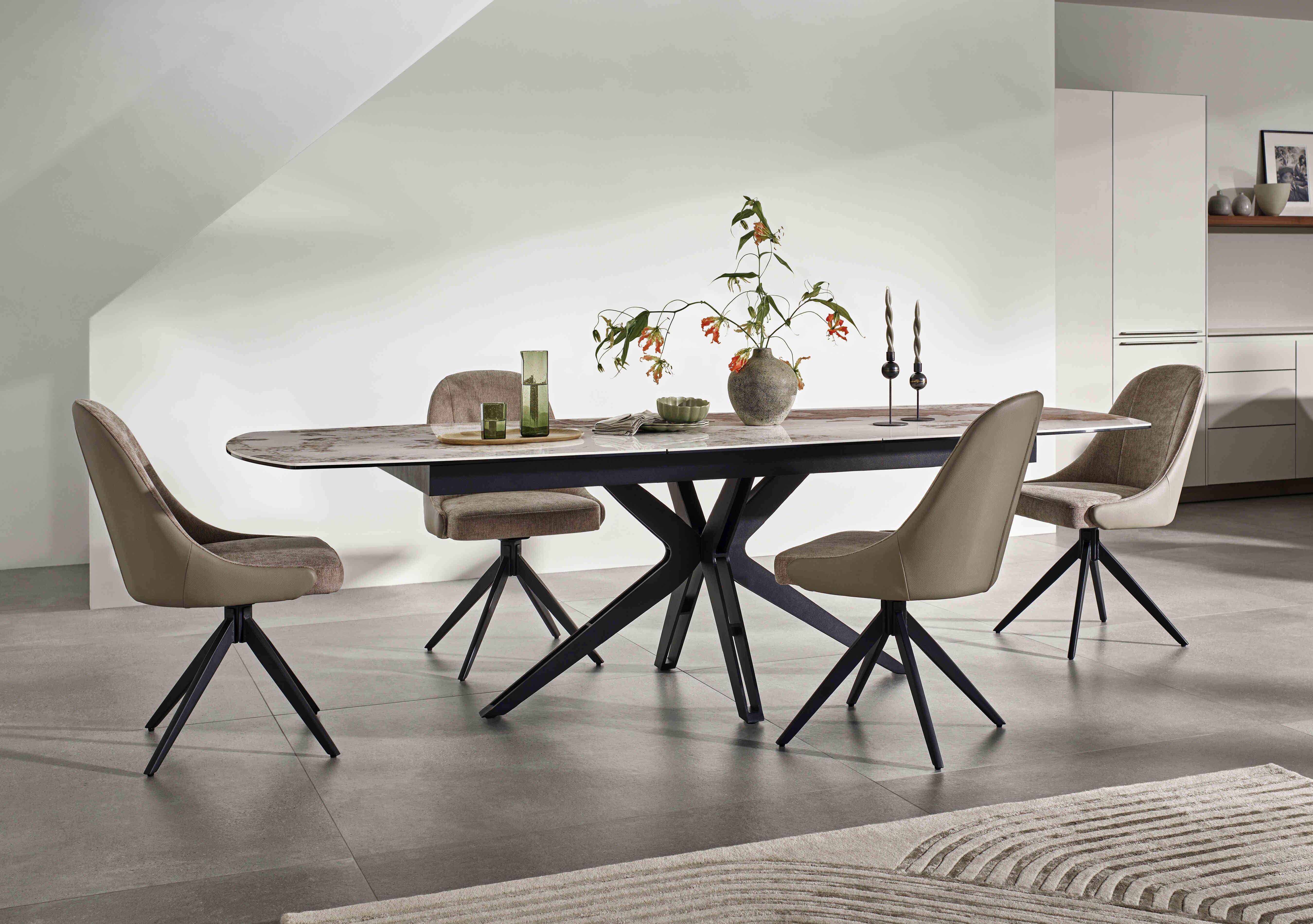 Jose Large Calcatta Marble Pop-up Extending Dining Table with 4 Swivel Dining Chairs in  on Furniture Village