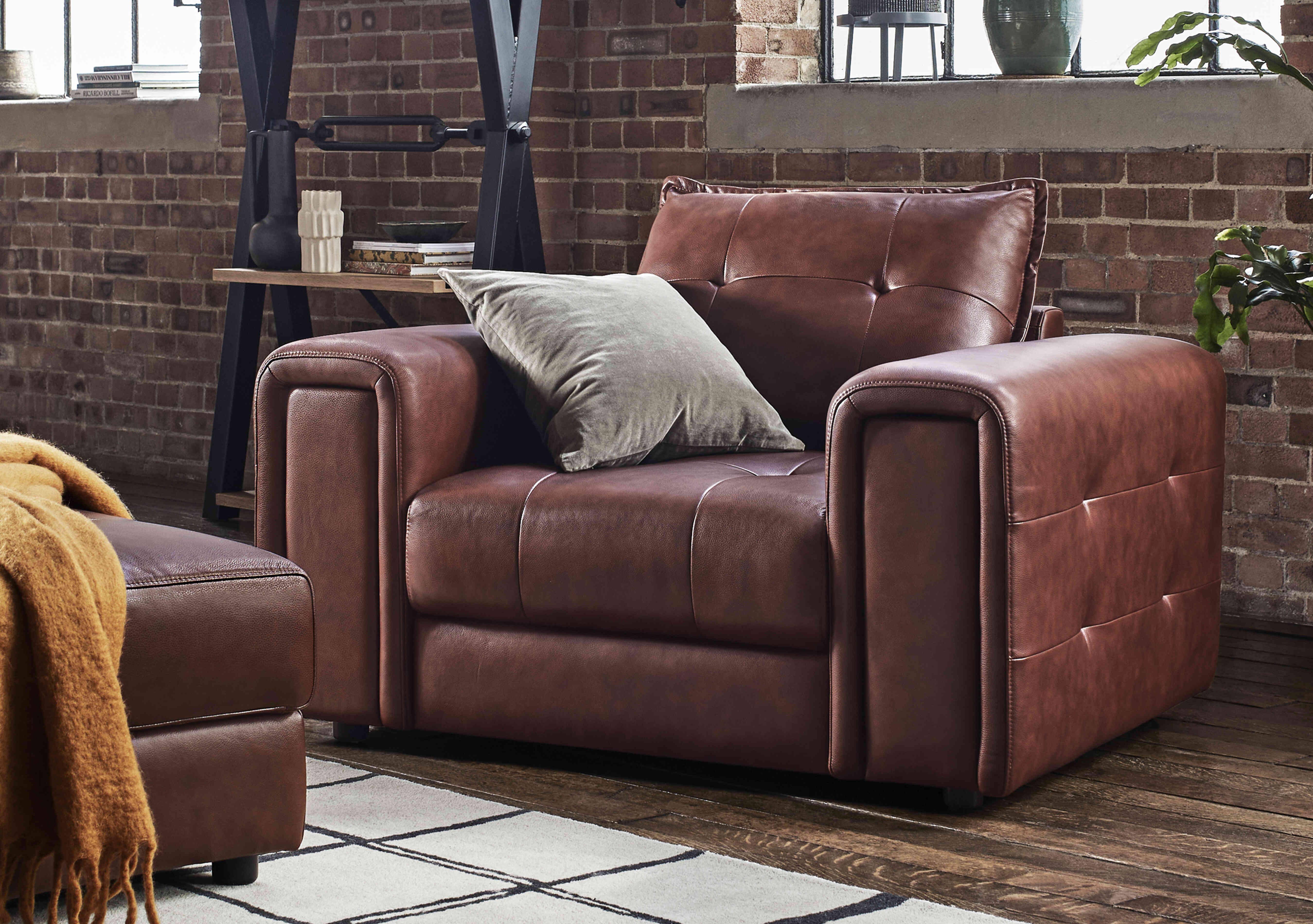 Boutique Goliath Leather Chair with Storage Drawer in  on Furniture Village
