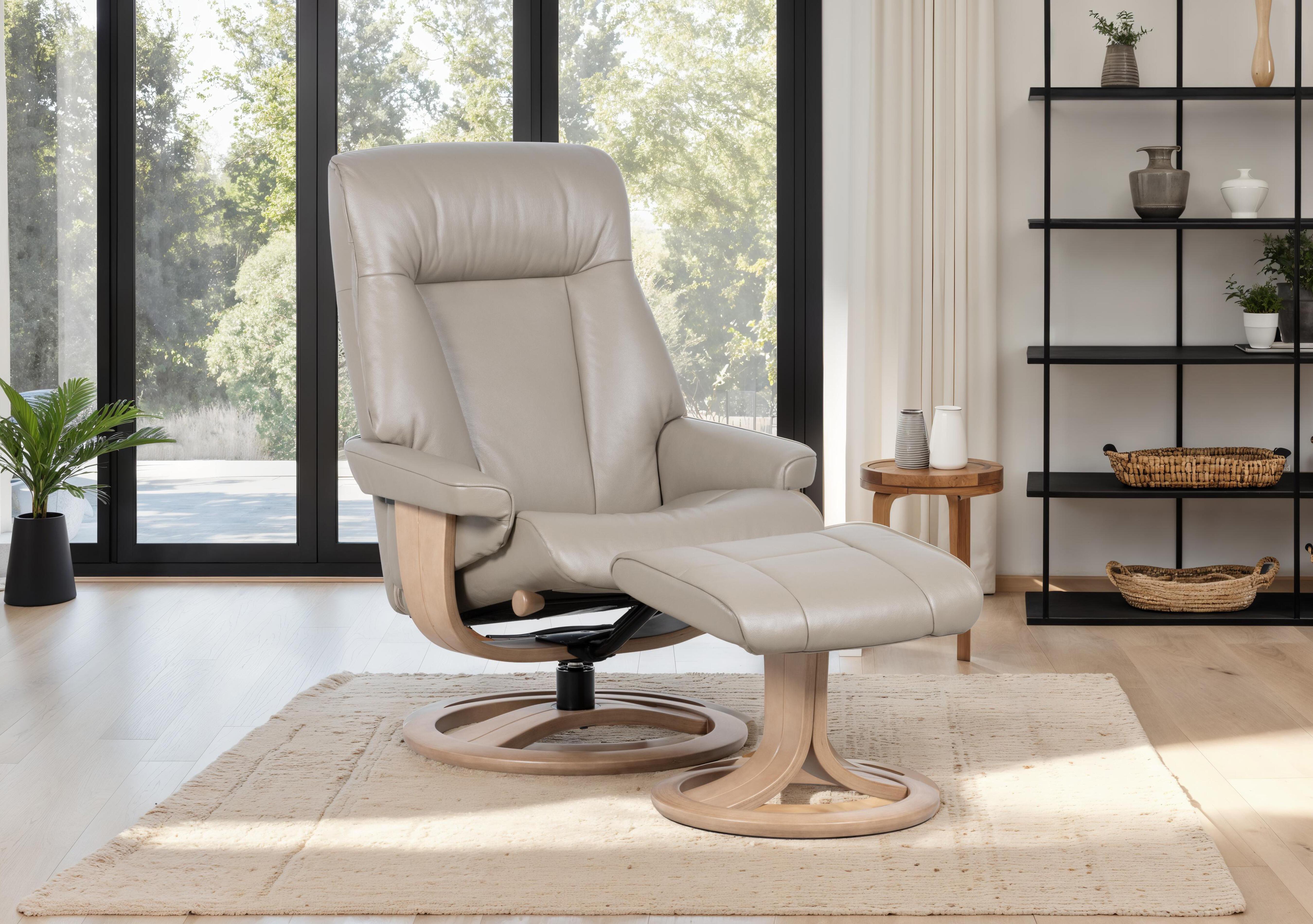 Tromso Large Leather Swivel Chair and Footstool in  on Furniture Village