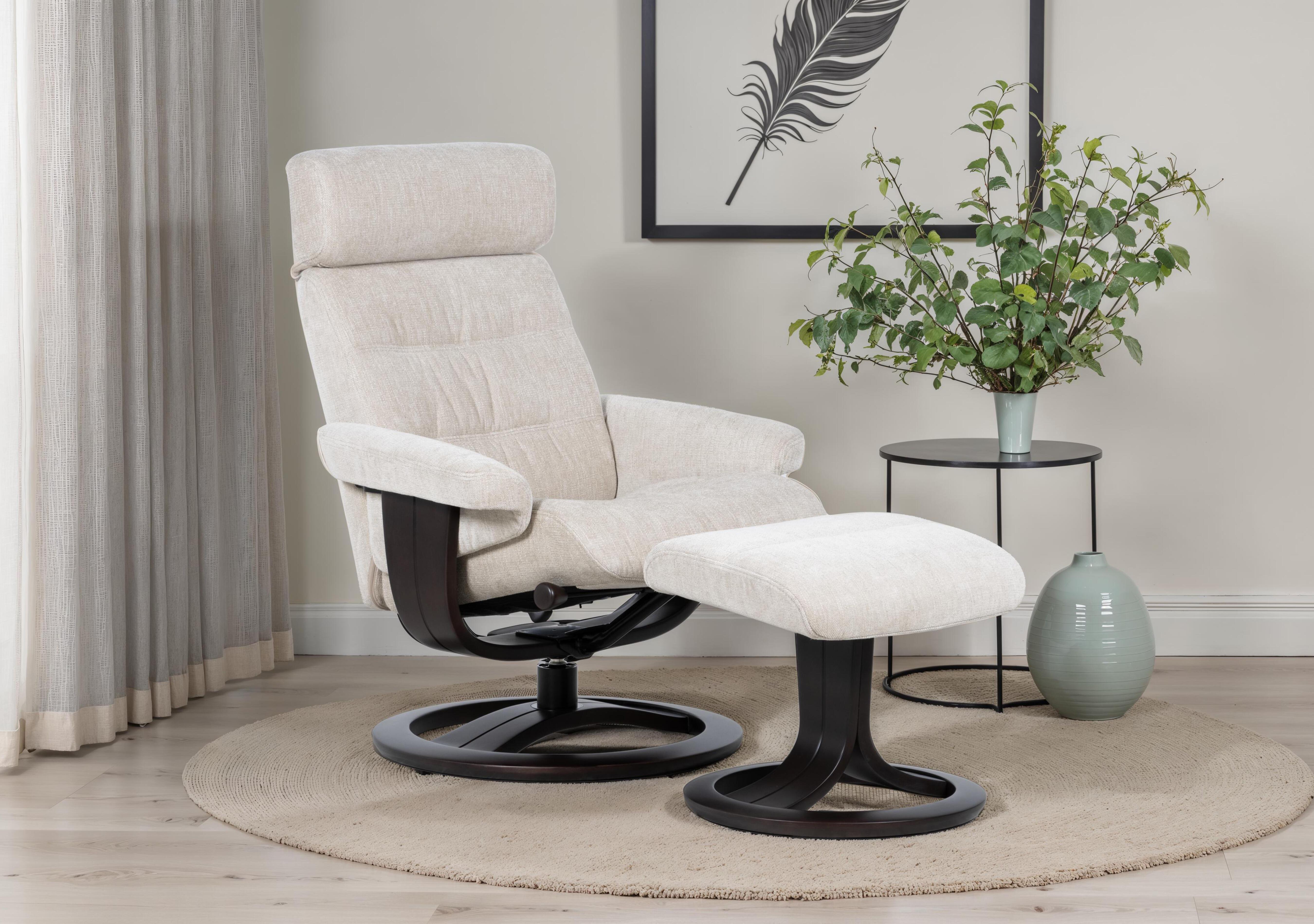Odense Large Fabric Swivel Chair and Footstool in  on Furniture Village