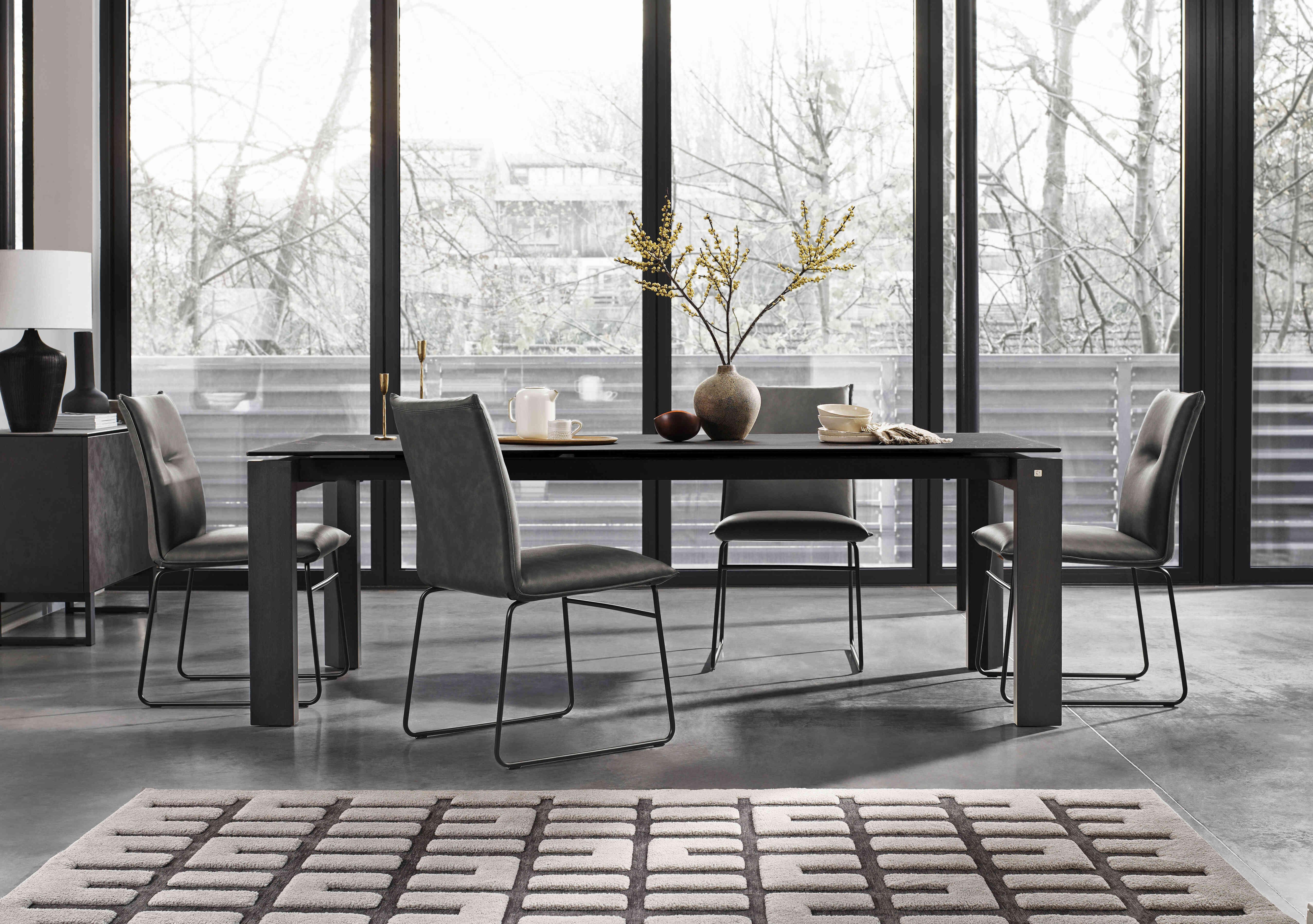 Viola 220cm Extra Large Extending Dining Table with Calacatta Ceramic Top and Graphite Wooden Legs and 4 Maya Dining Chairs in  on Furniture Village