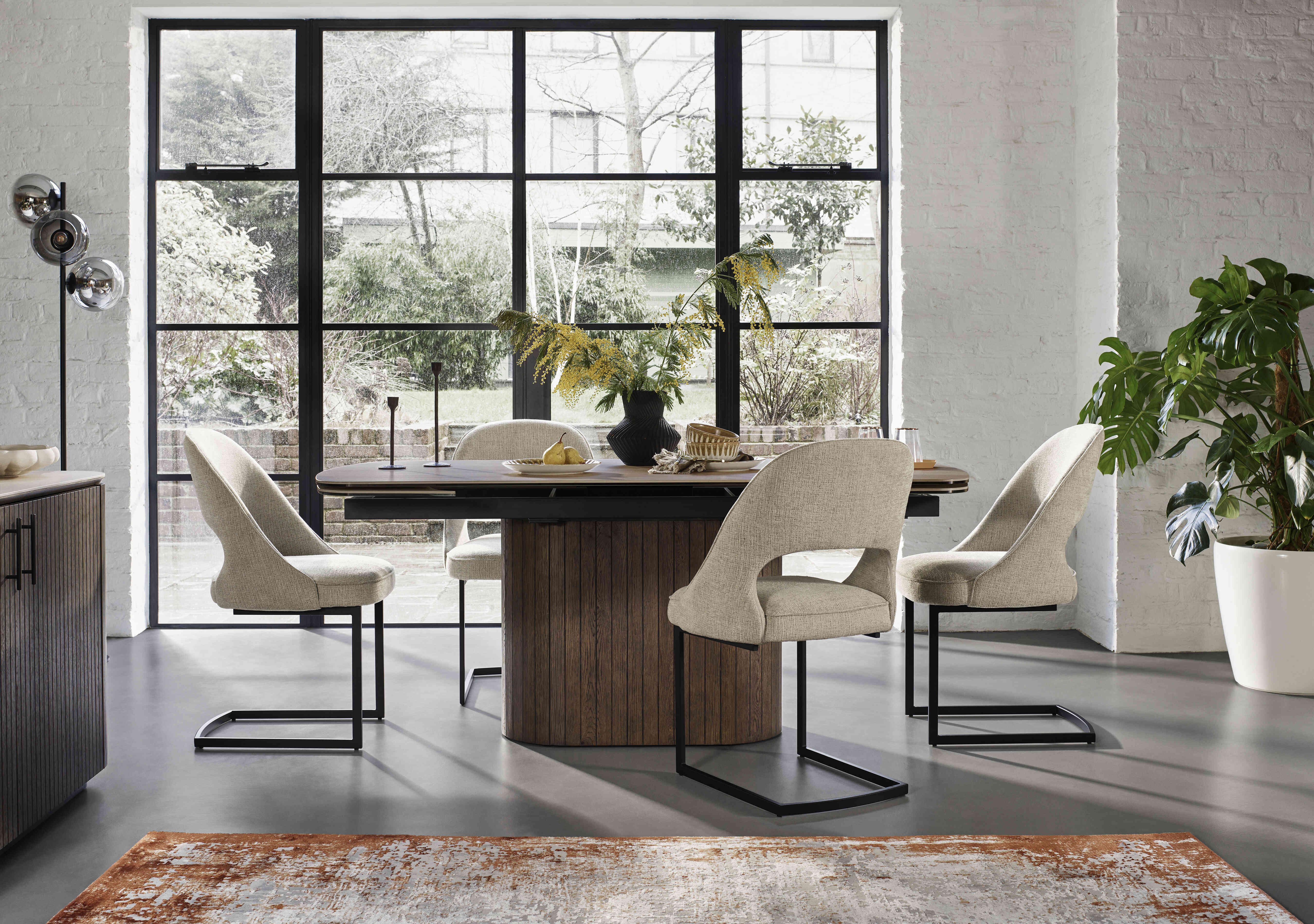 Tiber Draw Leaf Extending Dining Table with 4 Cantilever Dining Chairs in  on Furniture Village