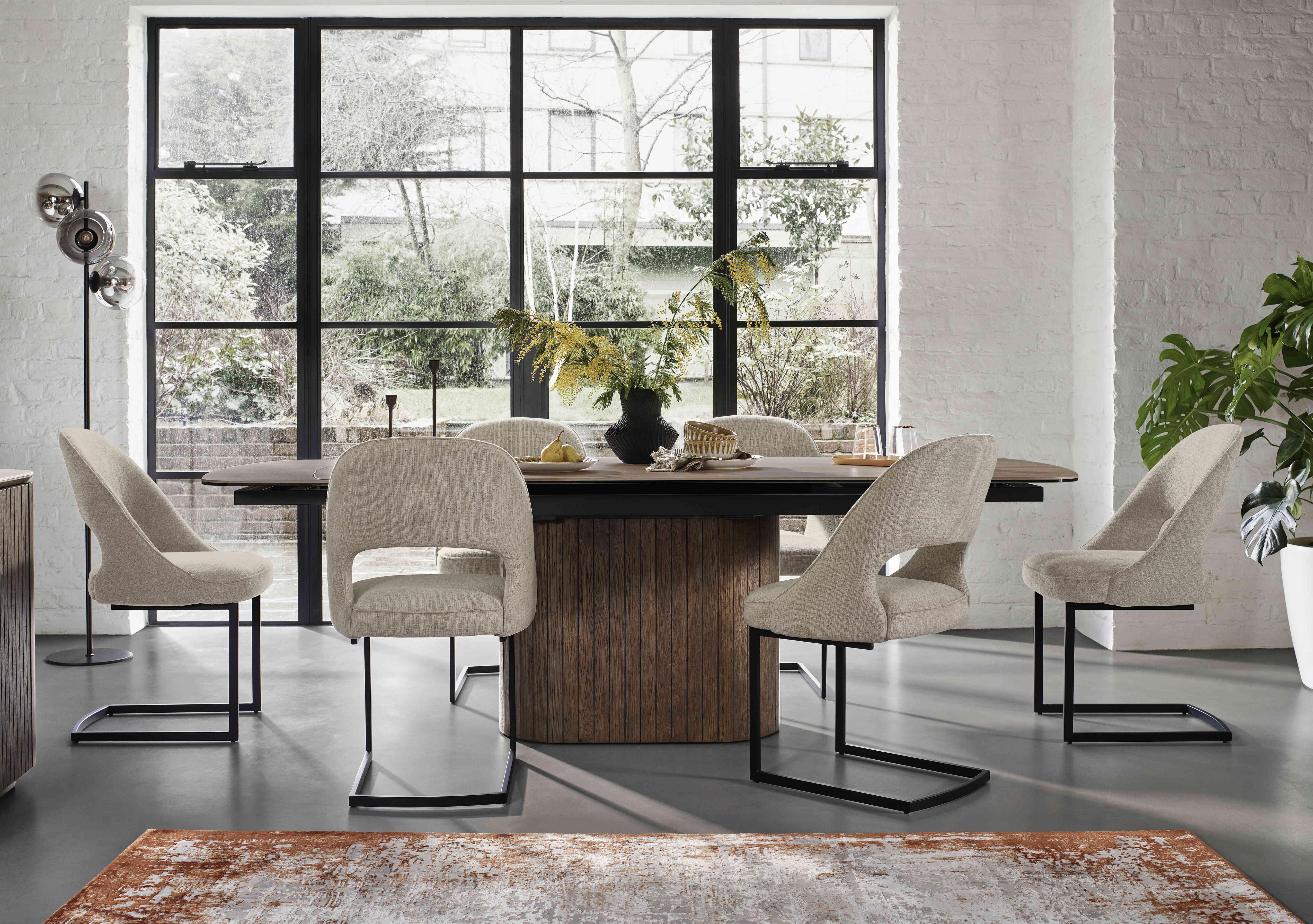 Tiber Draw Leaf Extending Dining Table with 6 Cantilever Dining Chairs in  on Furniture Village