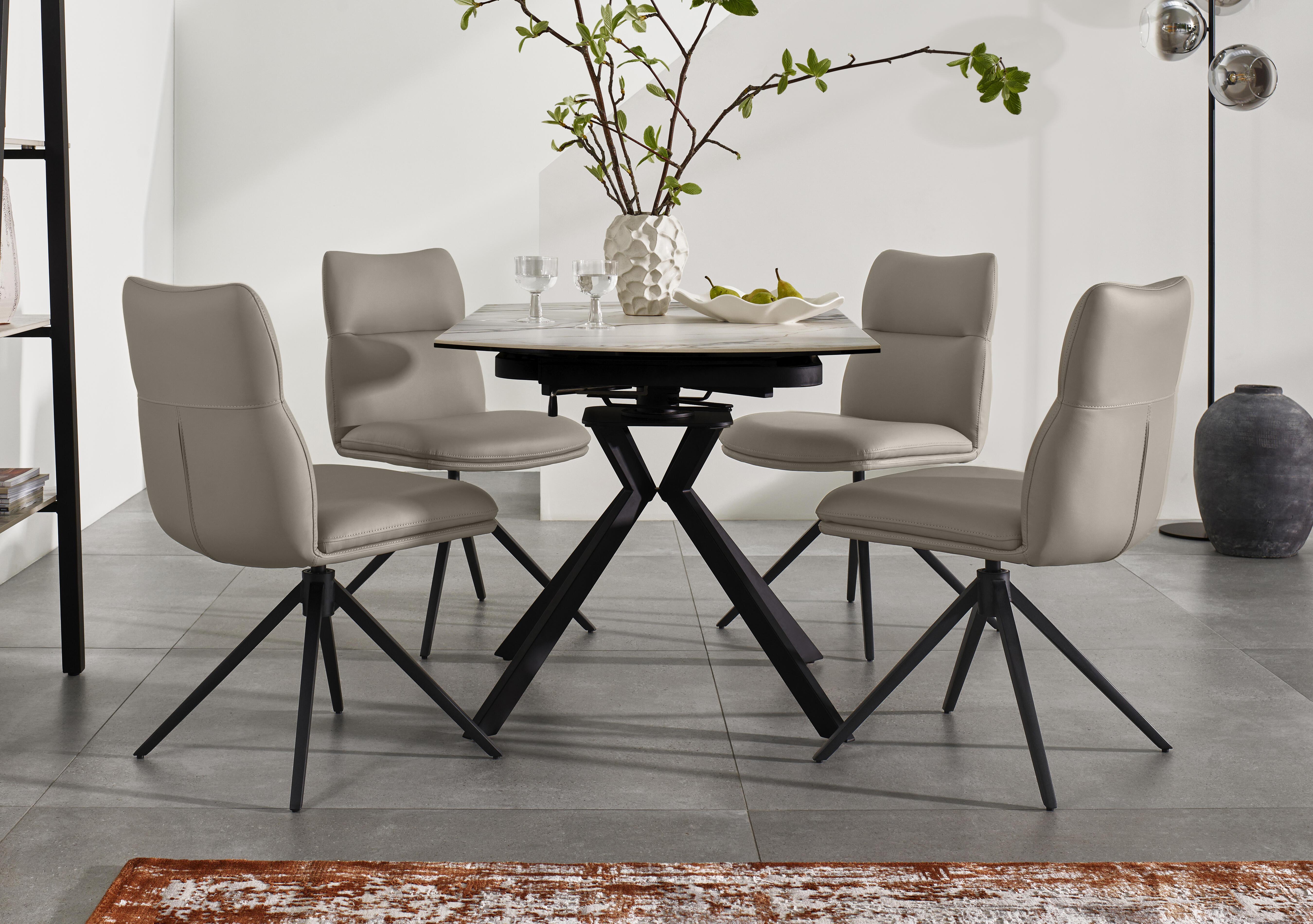 Quattro Extending Swivel Dining Table in  on Furniture Village