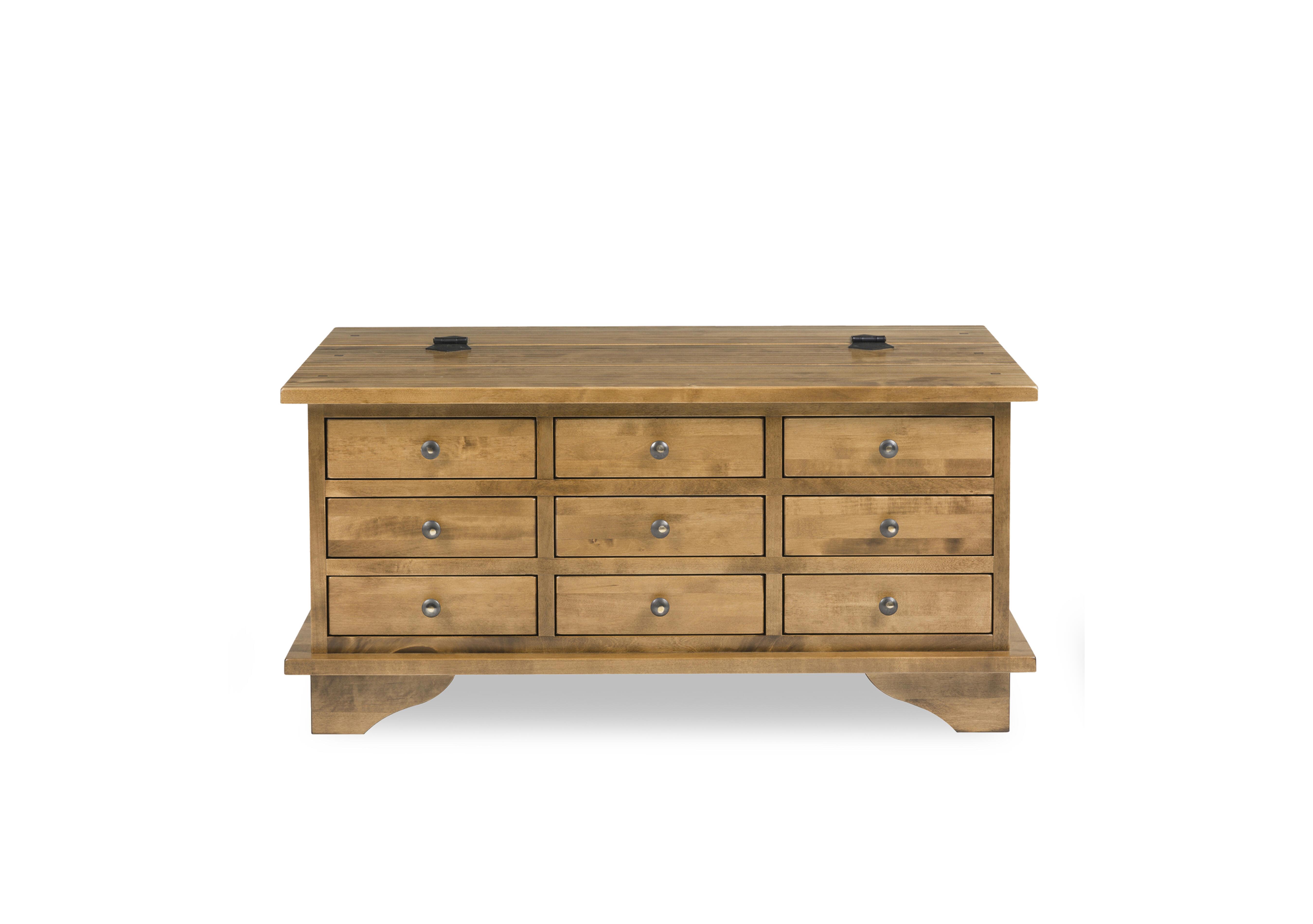 Garrat 9 Drawer Coffee Table in Honey on Furniture Village
