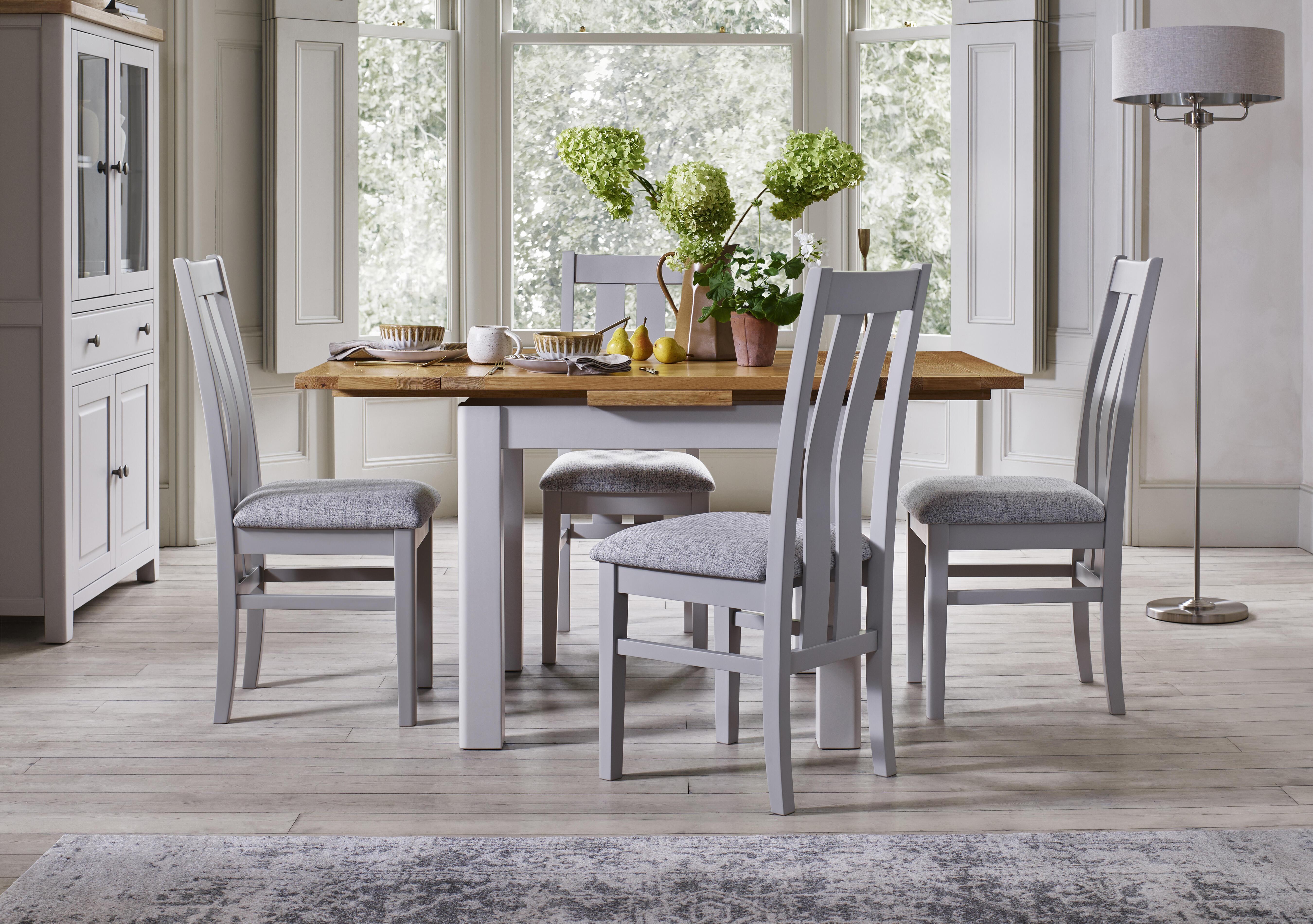 Lewis Small Draw Leaf Extending Dining Table and 4 Wooden Slatted Back Dining Chairs in  on Furniture Village