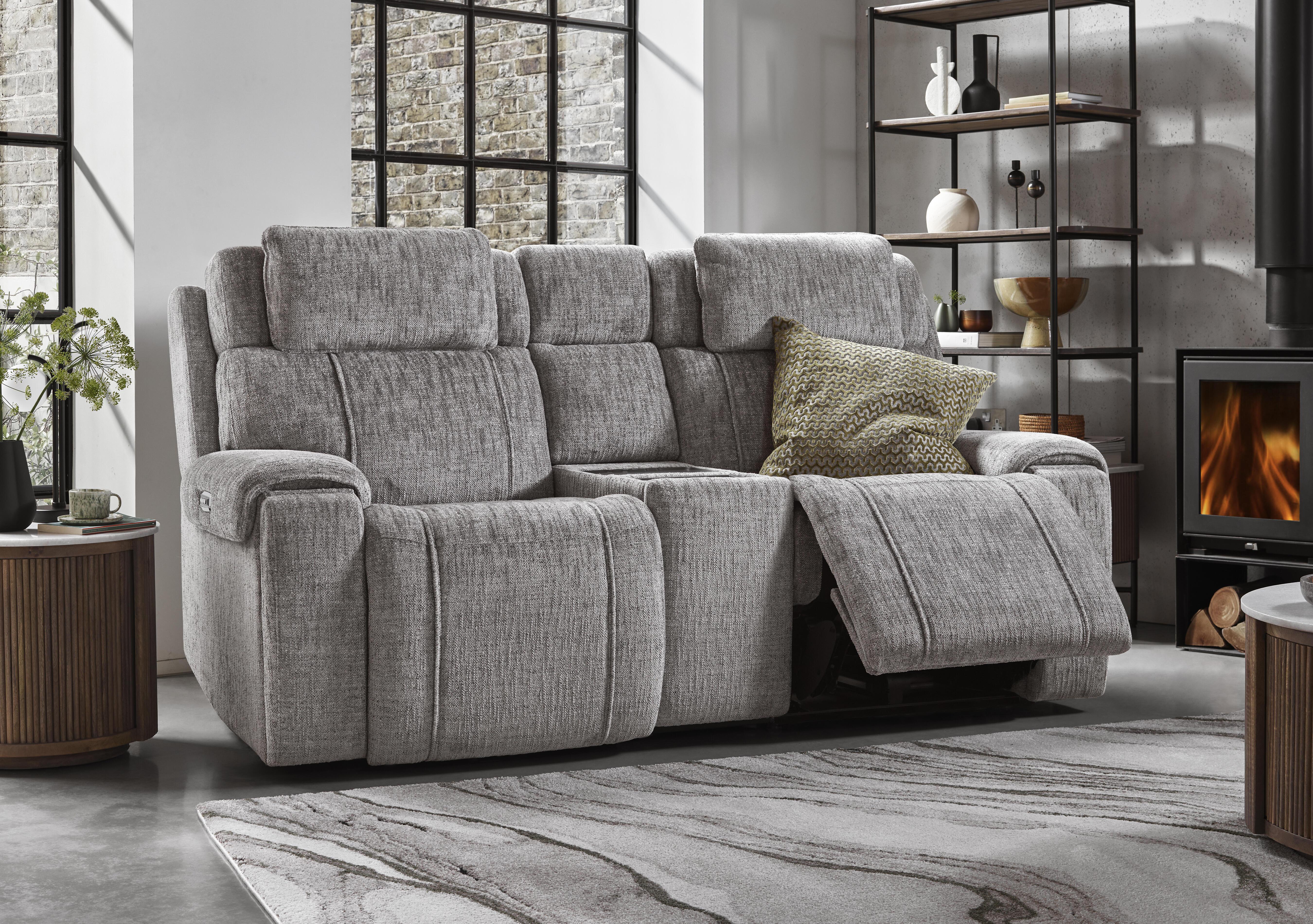Hollywood Fabric 3 Seater Power Recliner Media Sofa with Power Headrests and Storage Arms in  on Furniture Village