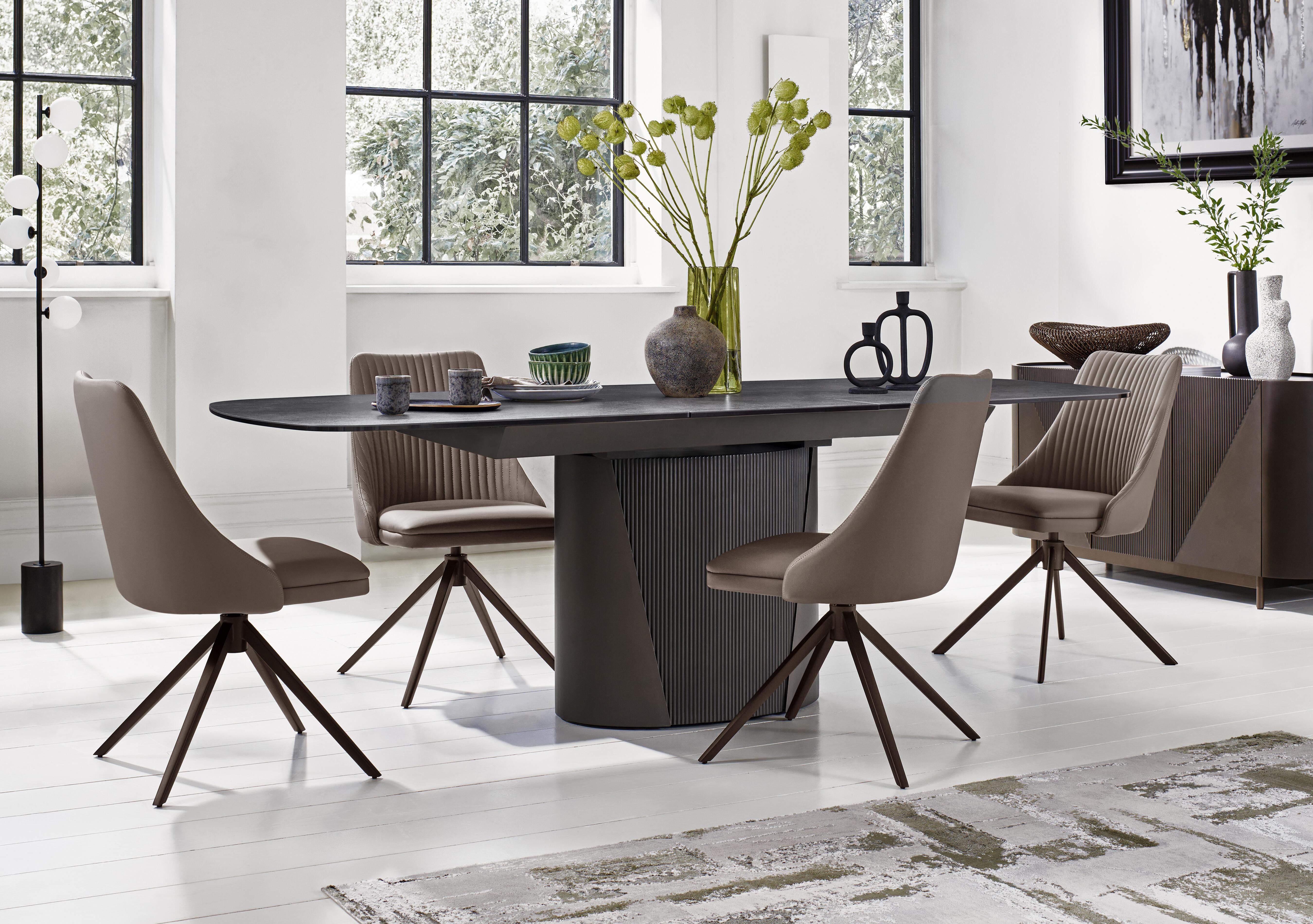 Icon Bronze Extending Dining Table and 4 Icon Dining Chairs with Bronze Legs in  on Furniture Village