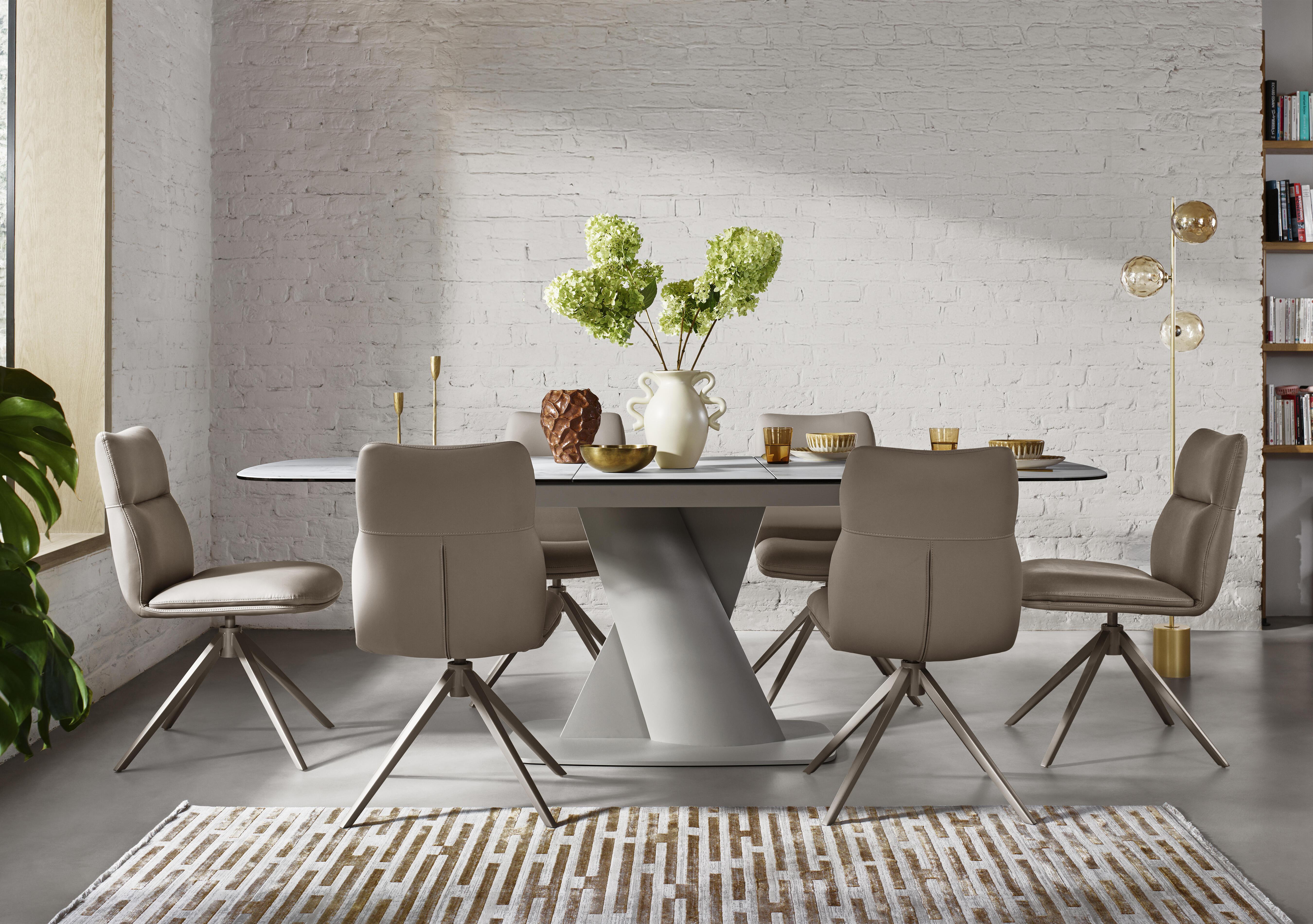 Diva Extending Dining Table and 6 Diva Dining Chairs with Silver Legs in  on Furniture Village