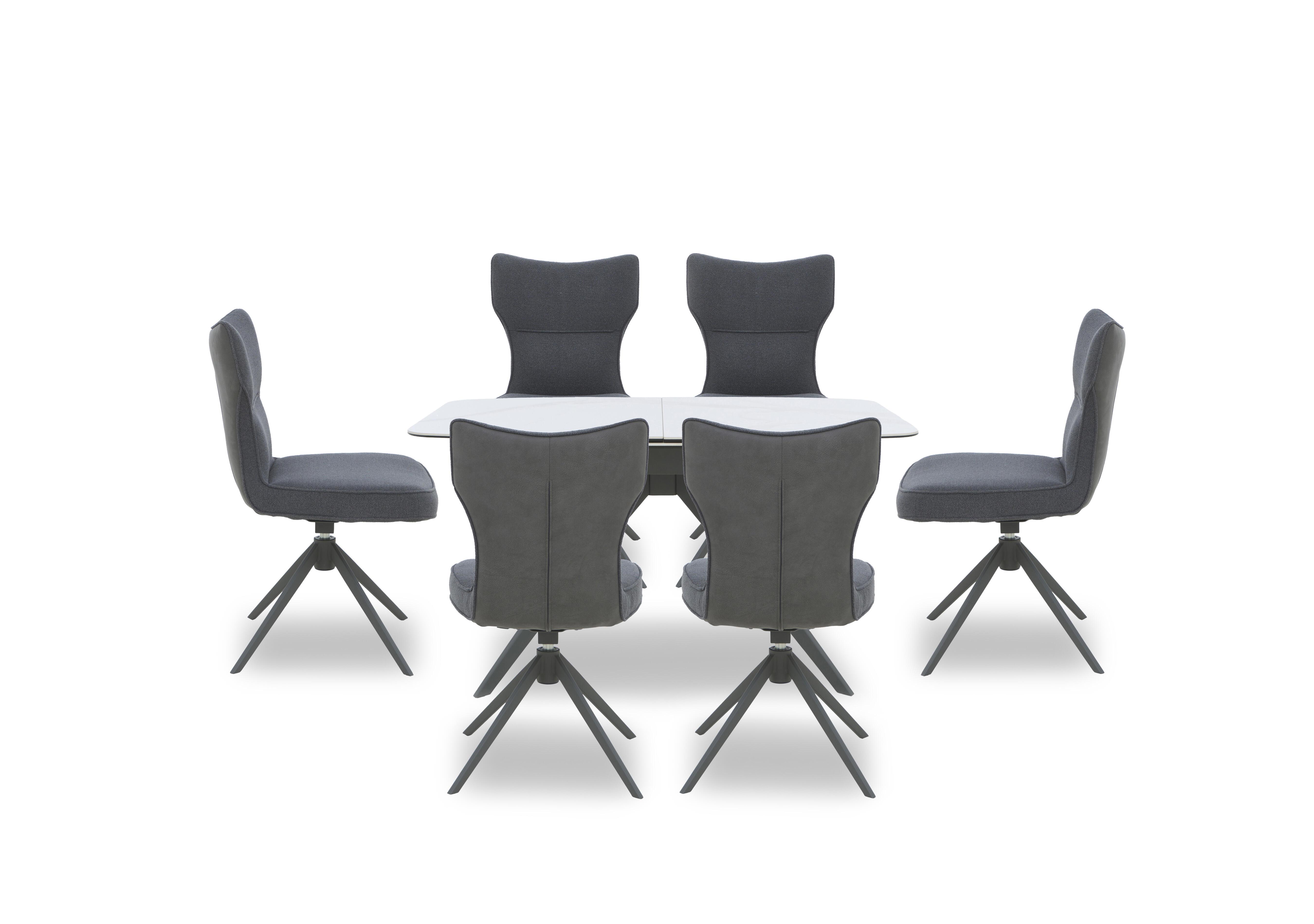 Carrera Pop Up Extending Dining Table and 6 Swivel Dining Chairs in  on Furniture Village