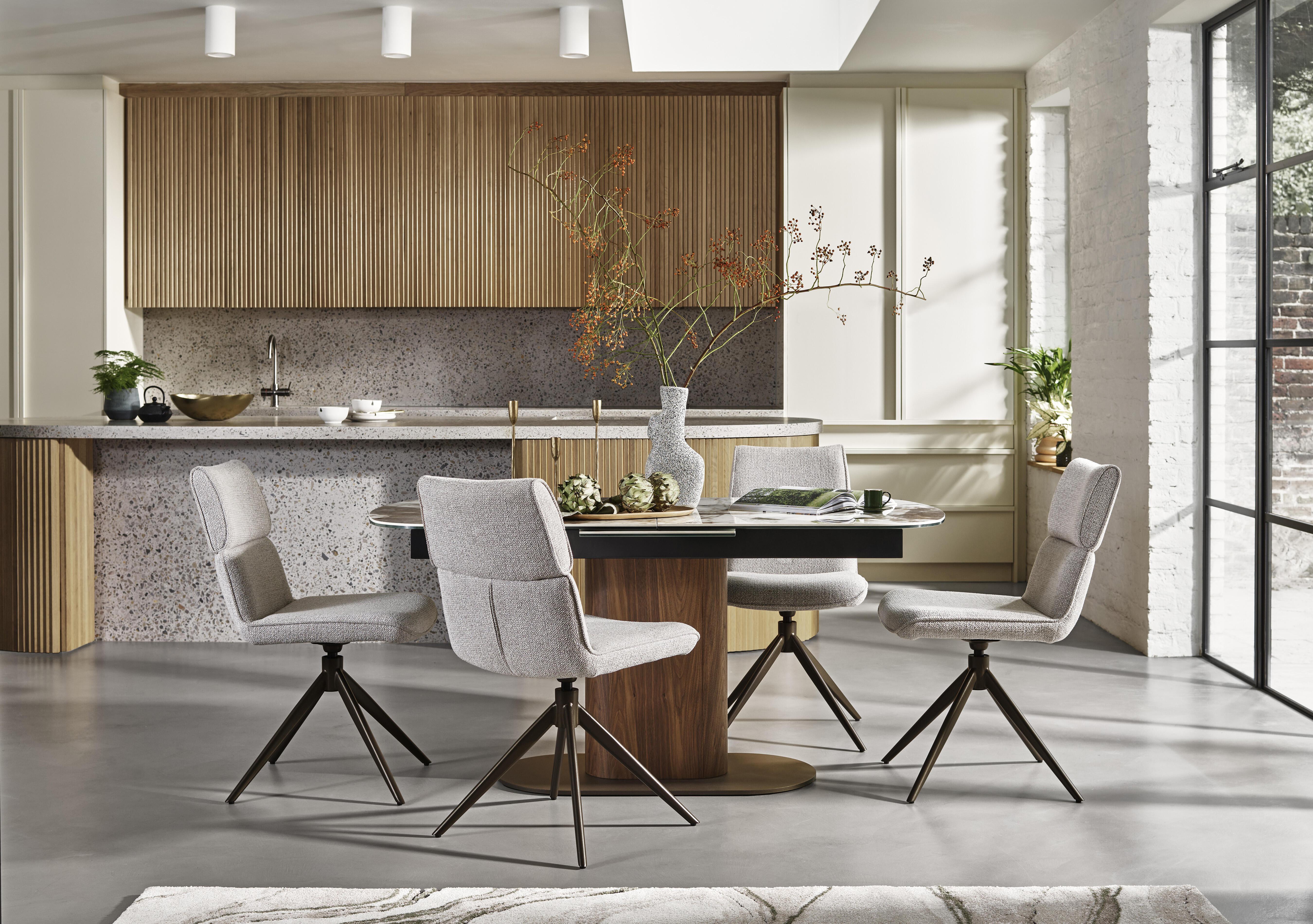 Mekong Extending Dining Table and 4 Fabric Swivel Dining Chairs in  on Furniture Village