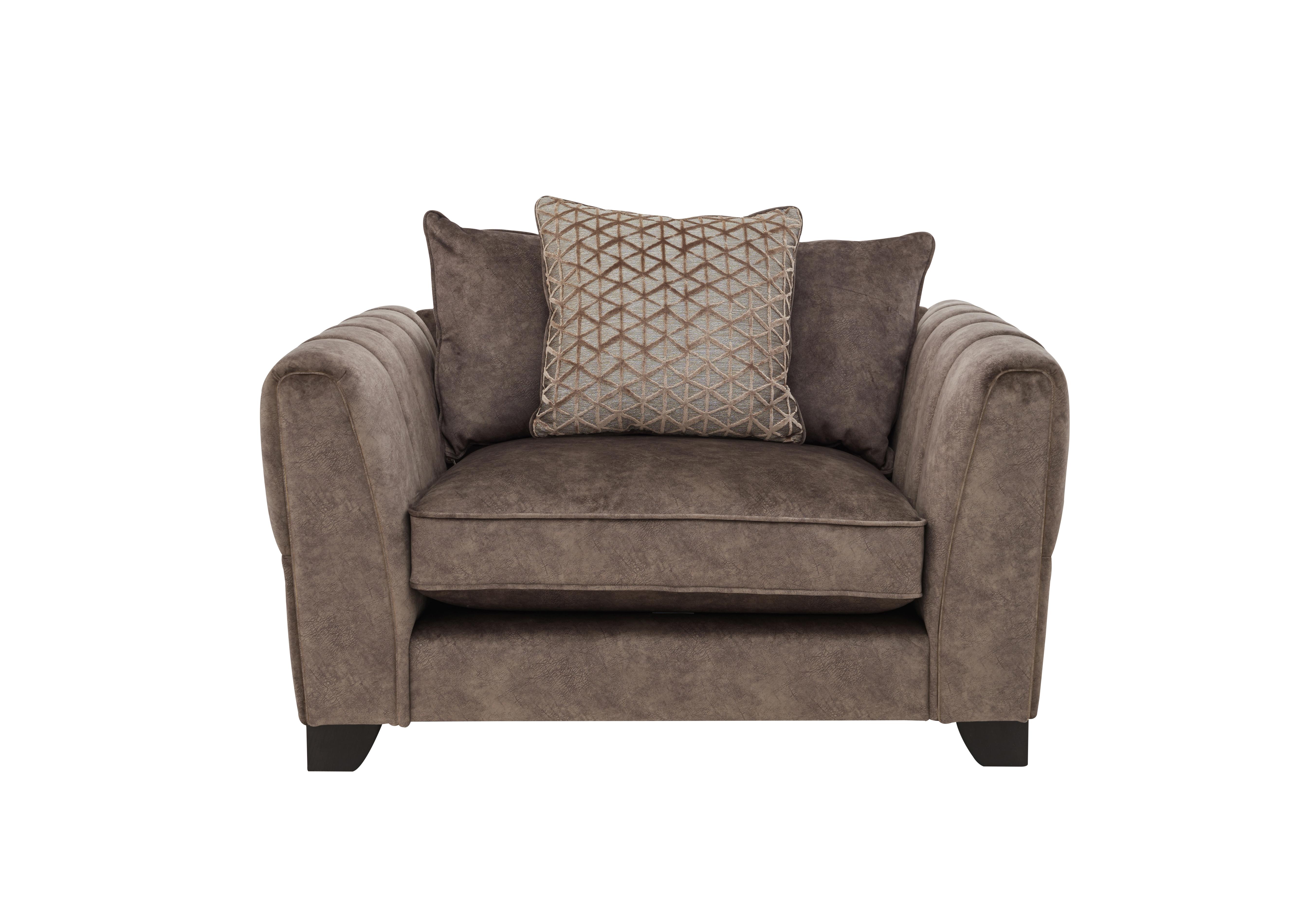 Oh So Glam Mariah Pillow Back Fabric Snuggler Chair in Dapple Chocolate-Tri No Insert on Furniture Village