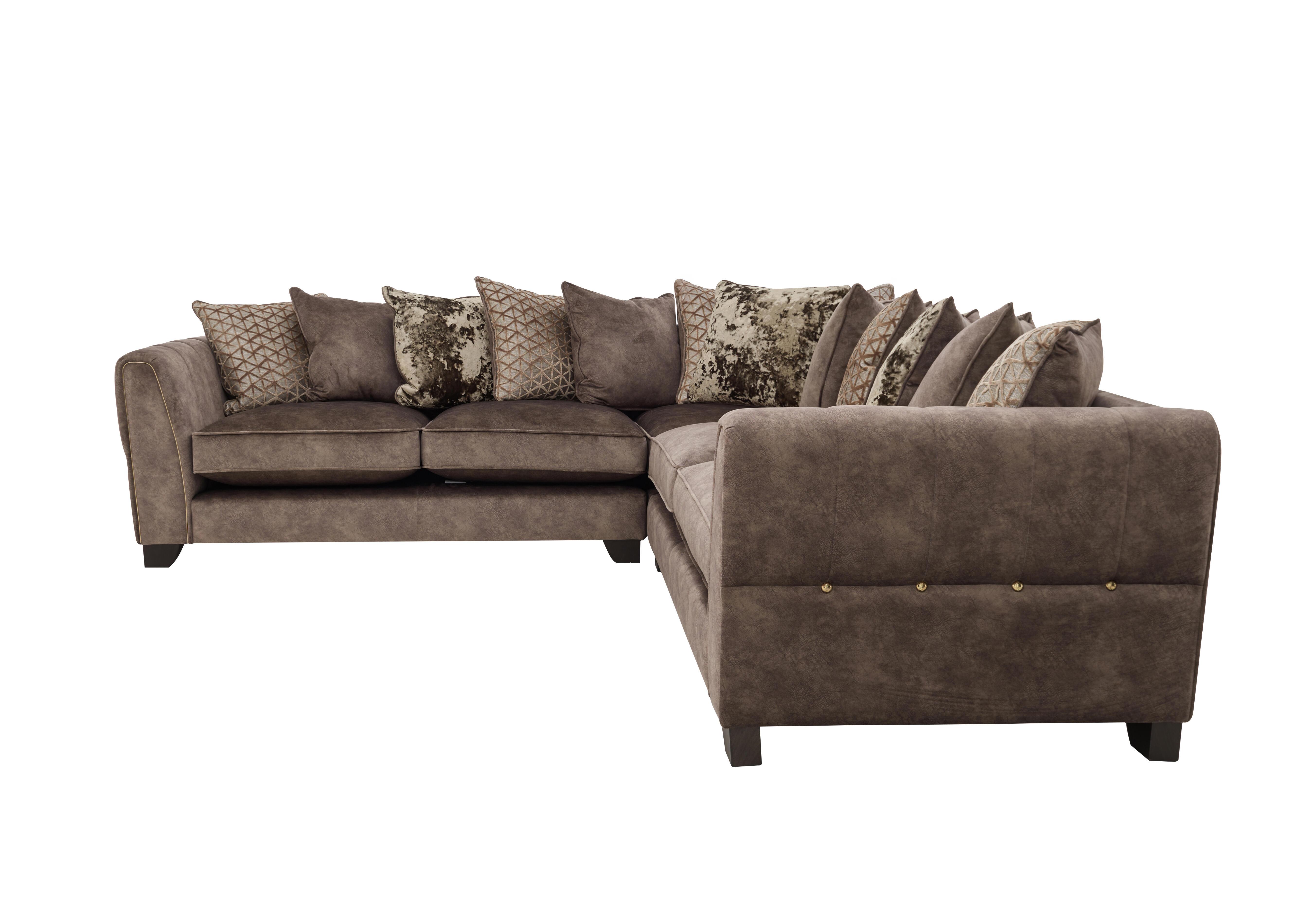Mariah Large Fabric Pillow Back Corner Sofa in Dapple Chocolate-Tri Brass on Furniture Village