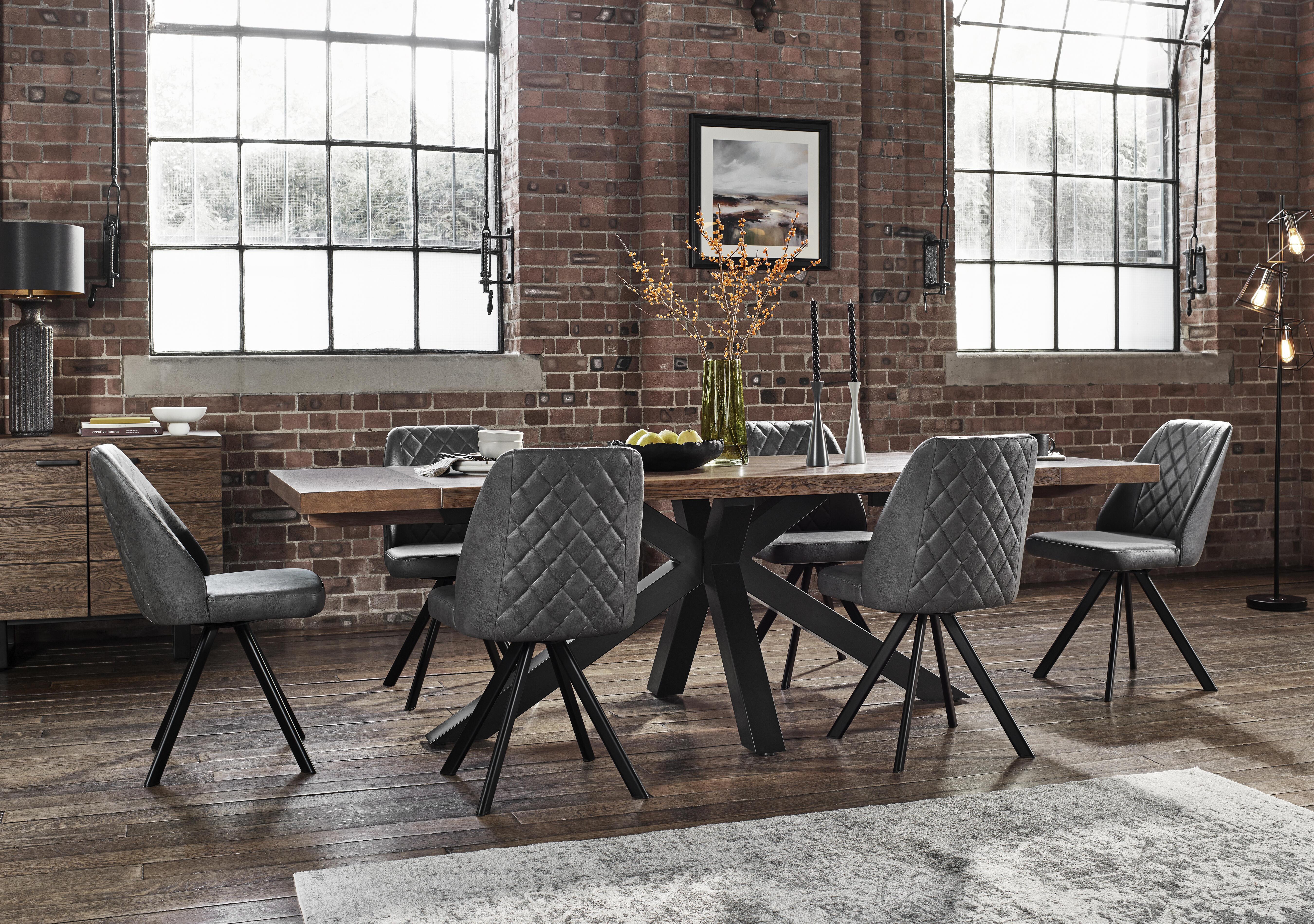Jupiter Dining Table with Star Base and 6 Swivel Dining Chairs in  on Furniture Village