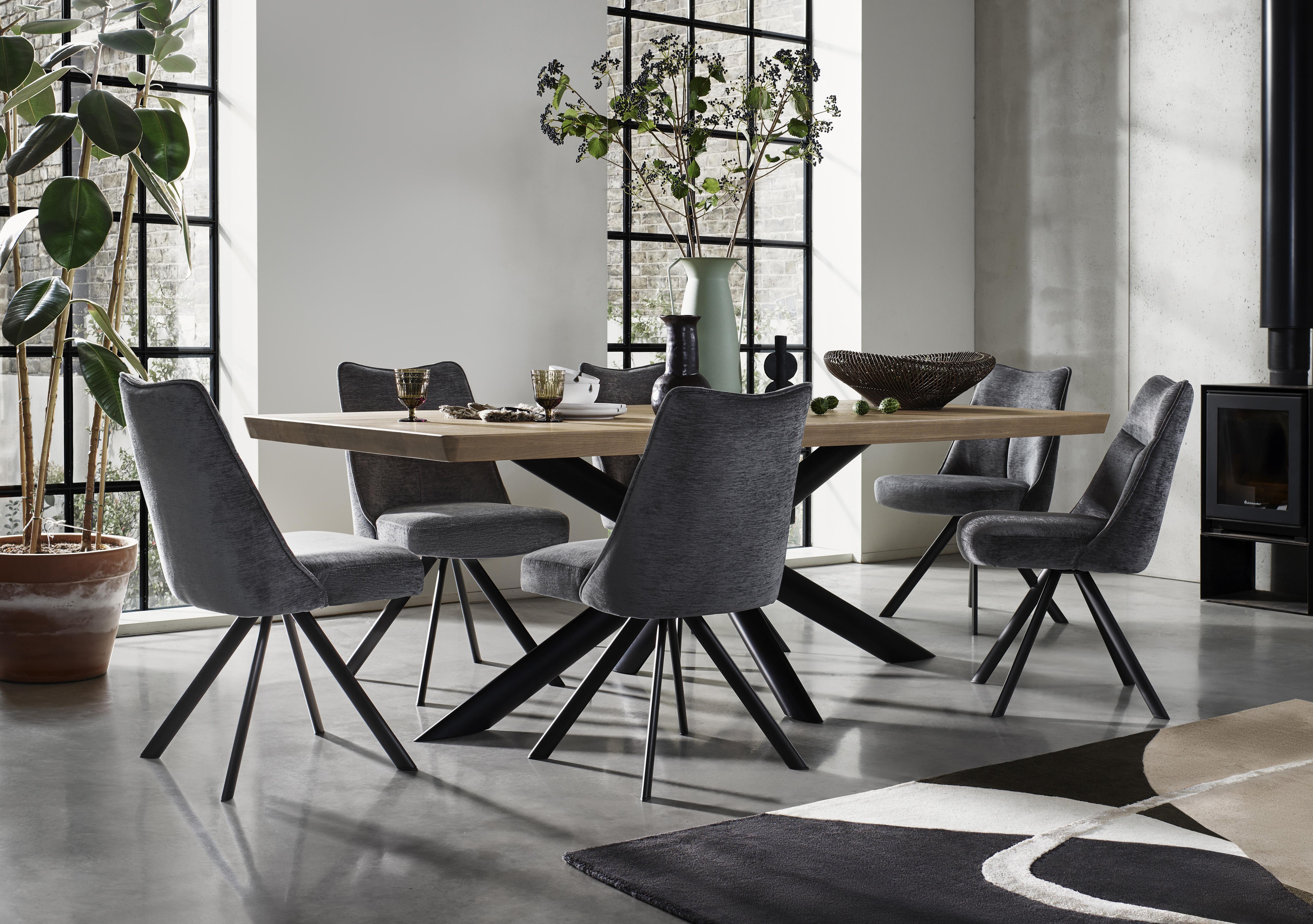 Athena Soft Edge Dining Table with 6 Swivel Dining Chairs in  on Furniture Village