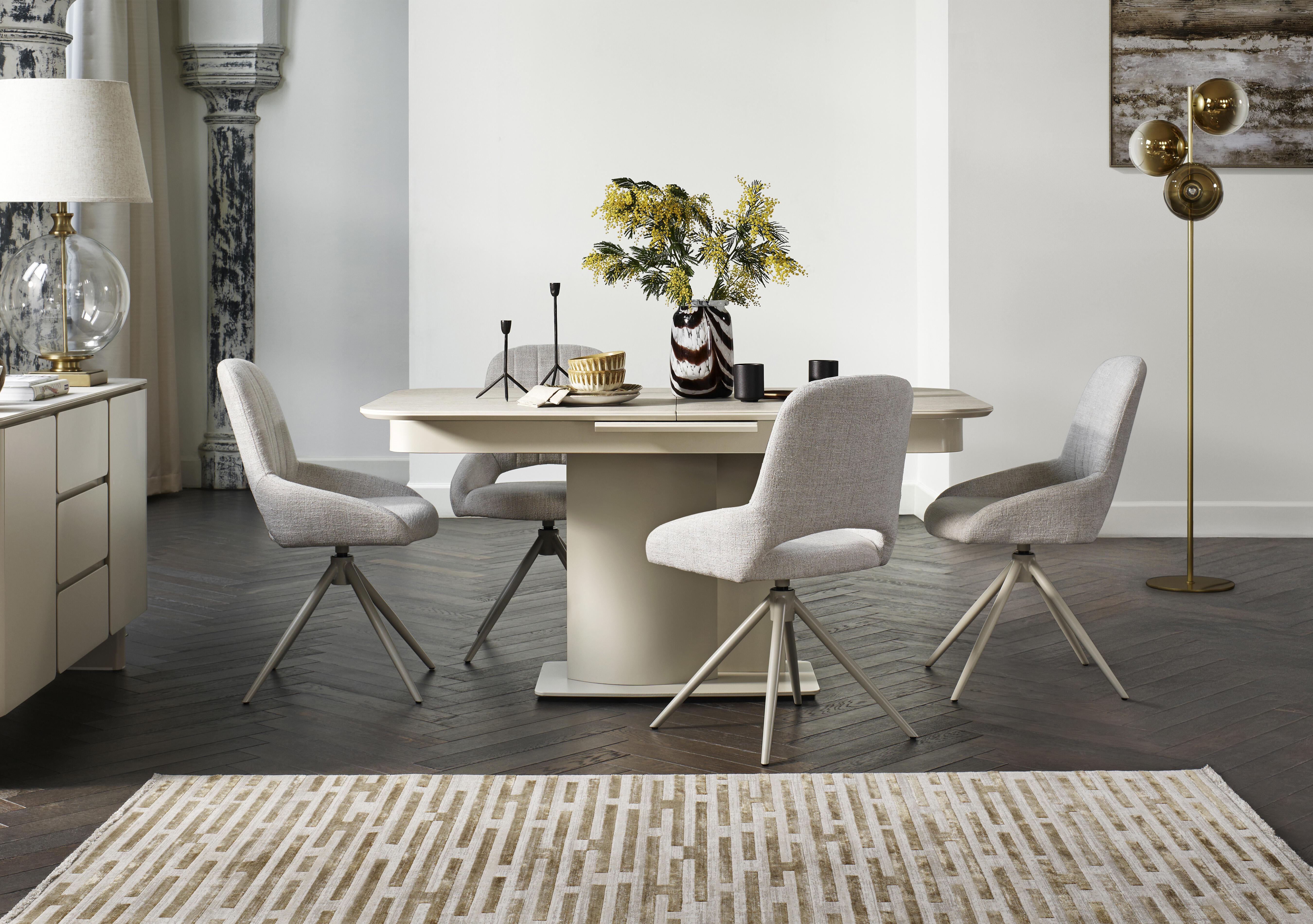 Pebble Pop Up Extending Dining Table and 4 Swivel Dining Chairs in  on Furniture Village