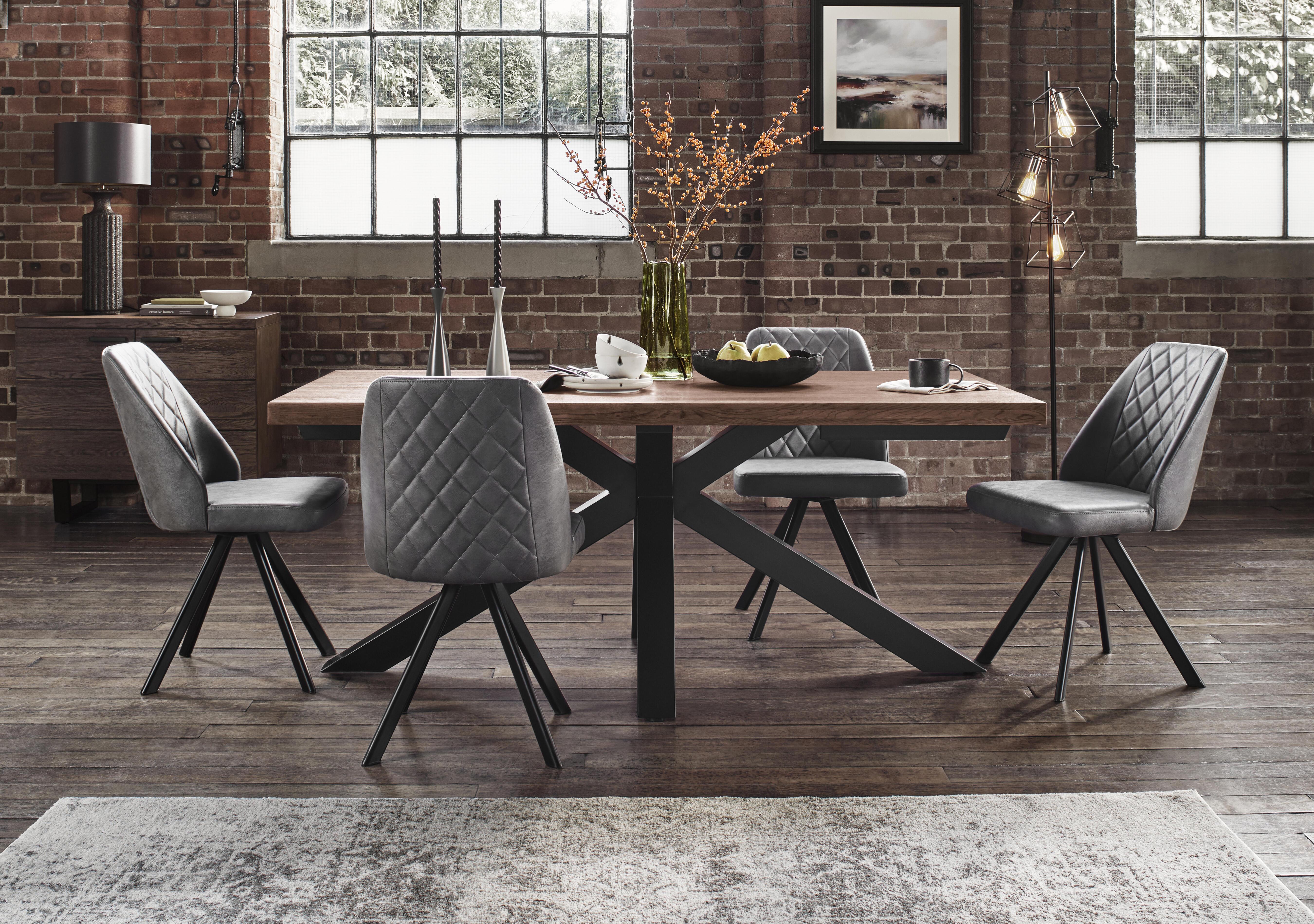 Jupiter Dining Table with Star Base and 4 Swivel Dining Chairs in  on Furniture Village