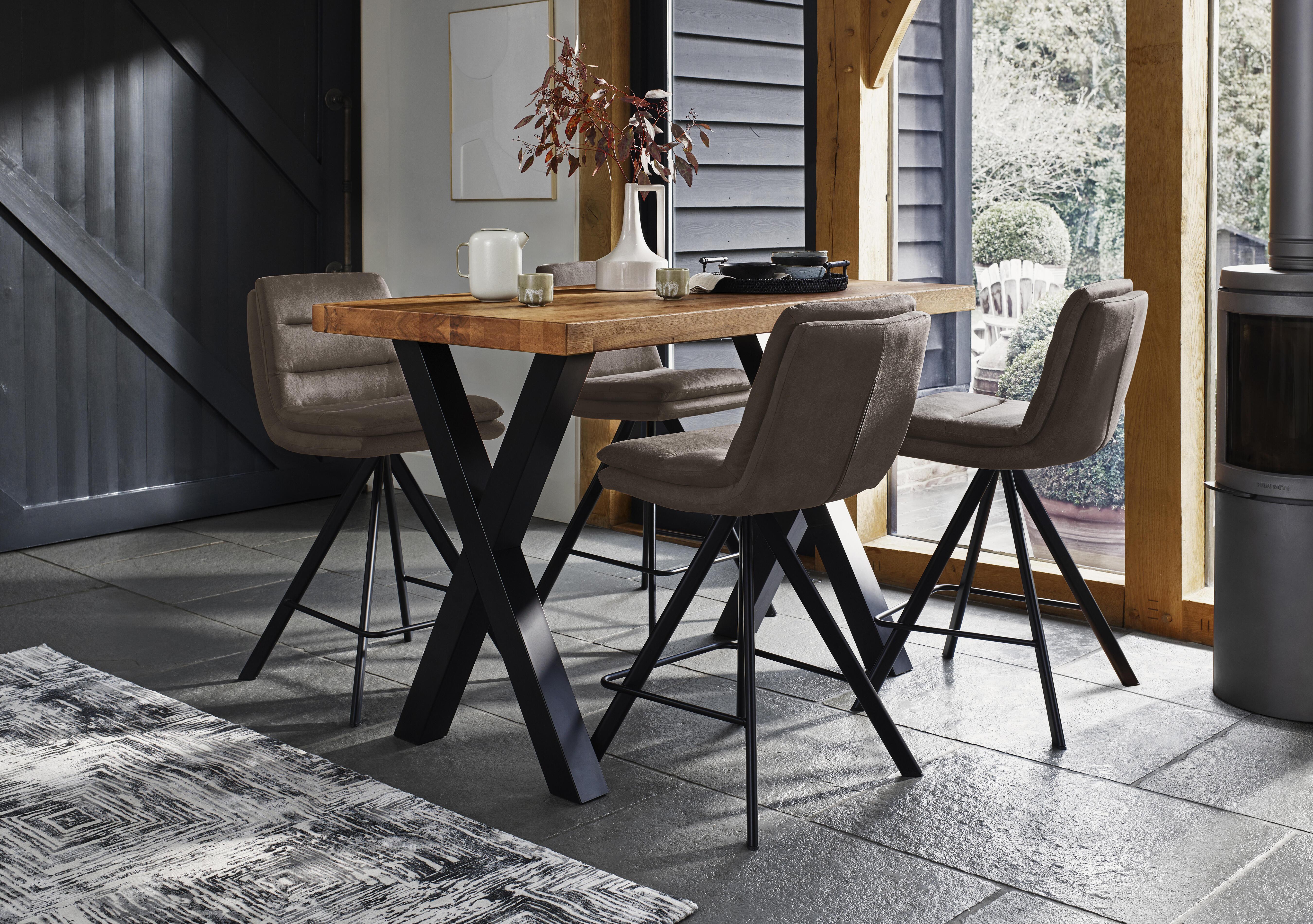Hades 140cm Straight Edge Bar Table with X Shaped Legs and 4 Njord Anthracite Fabric Swivel Bar Stools in  on Furniture Village