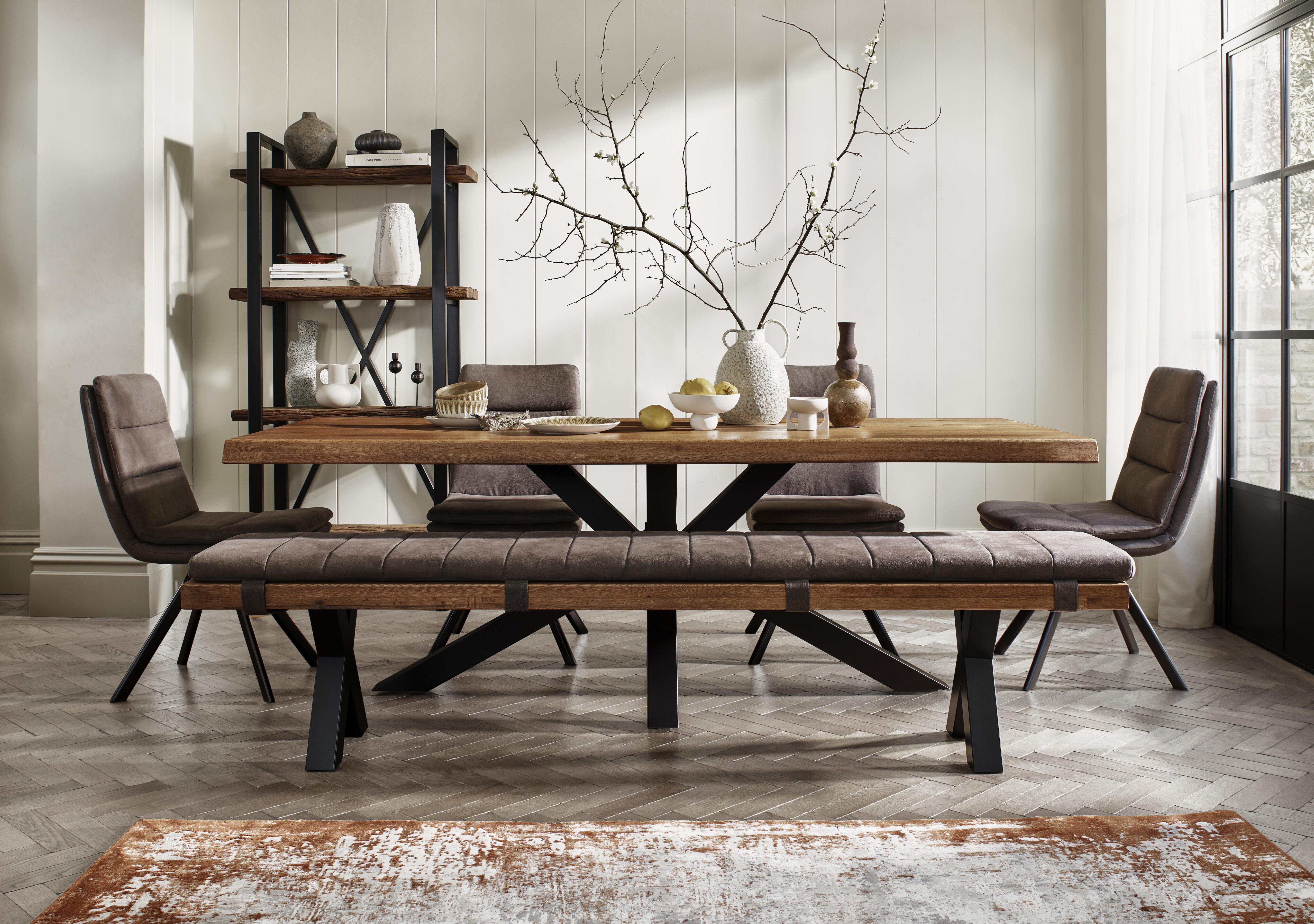 Njord Raw Edge Dining Table with Metal Star Base, Dining Bench and 4 Anthracite Fabric Swivel Dining Chairs in  on Furniture Village
