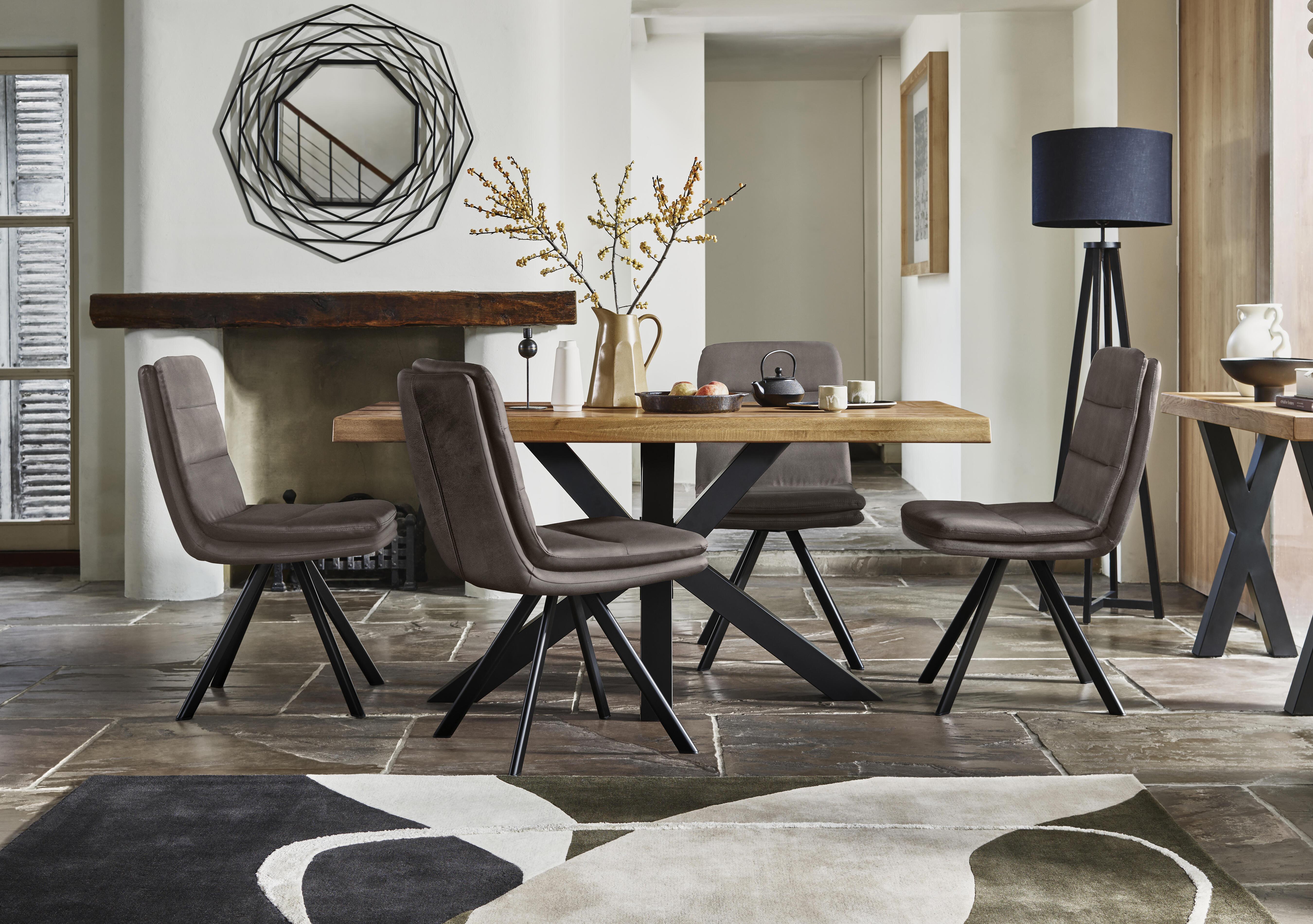 Njord 160cm Compact Raw Edge Dining Table with Metal Star Base and 4 Anthracite Fabric Swivel Dining Chairs in  on Furniture Village