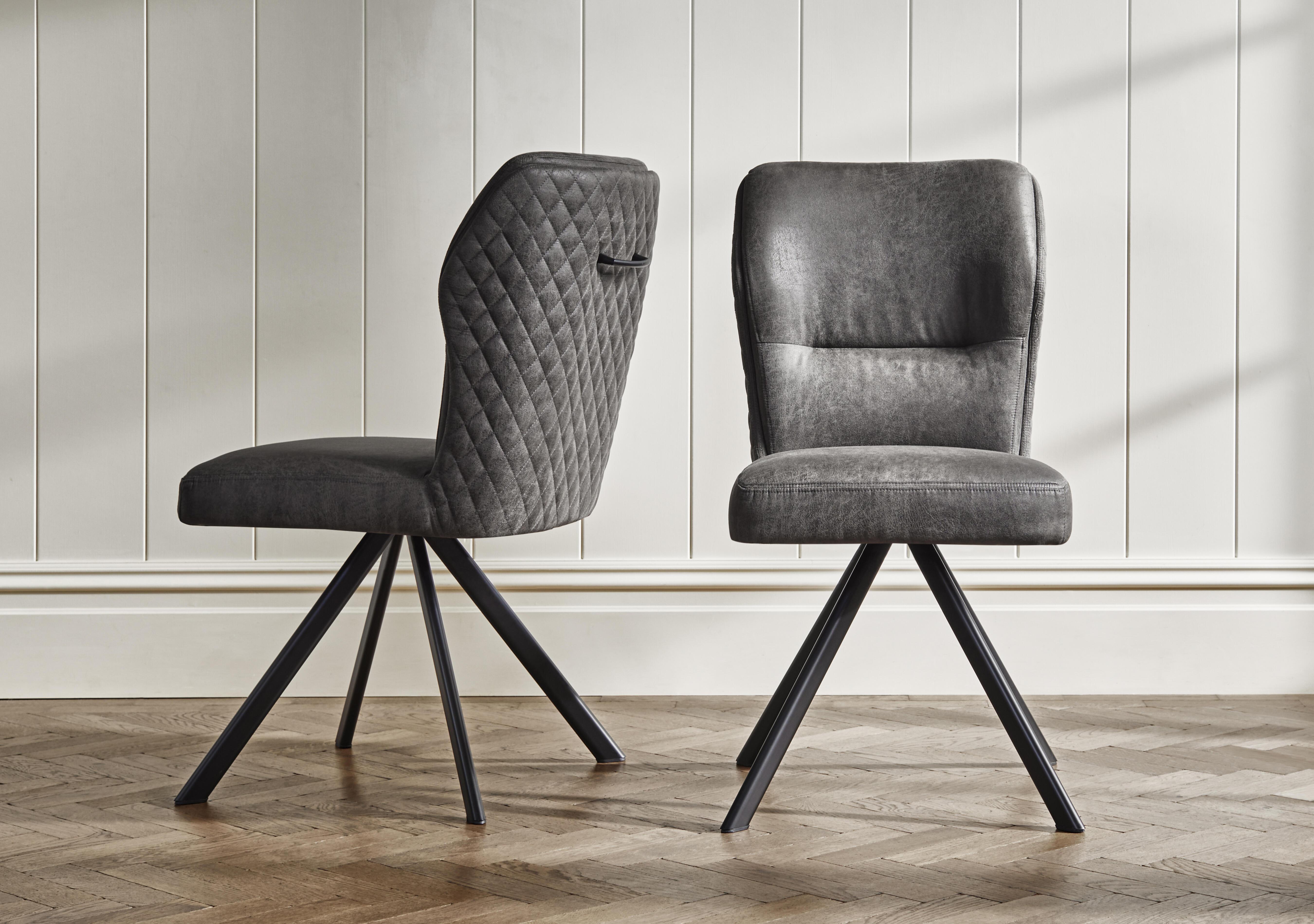 Terra Pair of Fabric Swivel Dining Chairs in  on Furniture Village