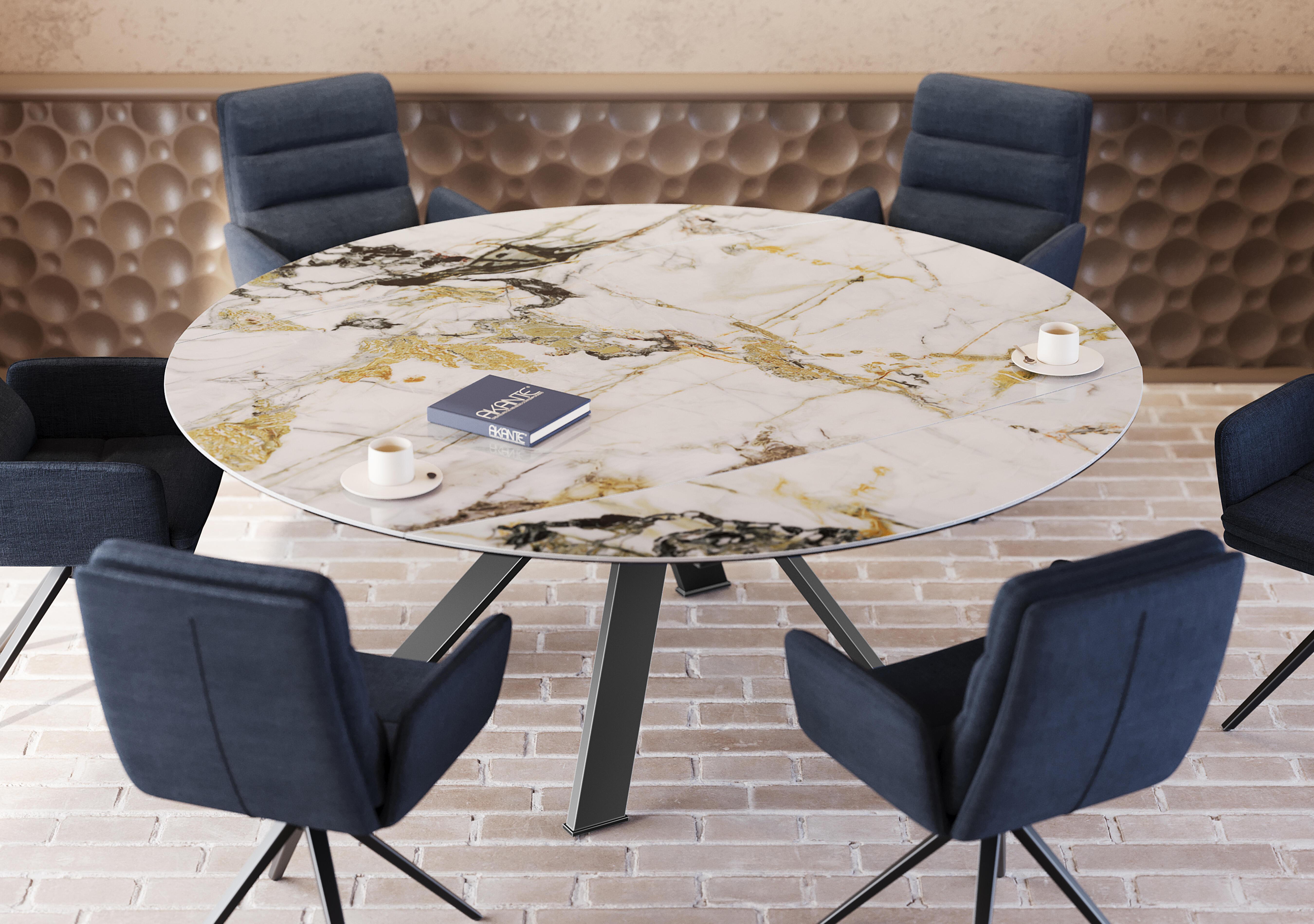 Felipe Swivel Extending Dining Table and 4 Swivel Dining Arm Chairs in  on Furniture Village