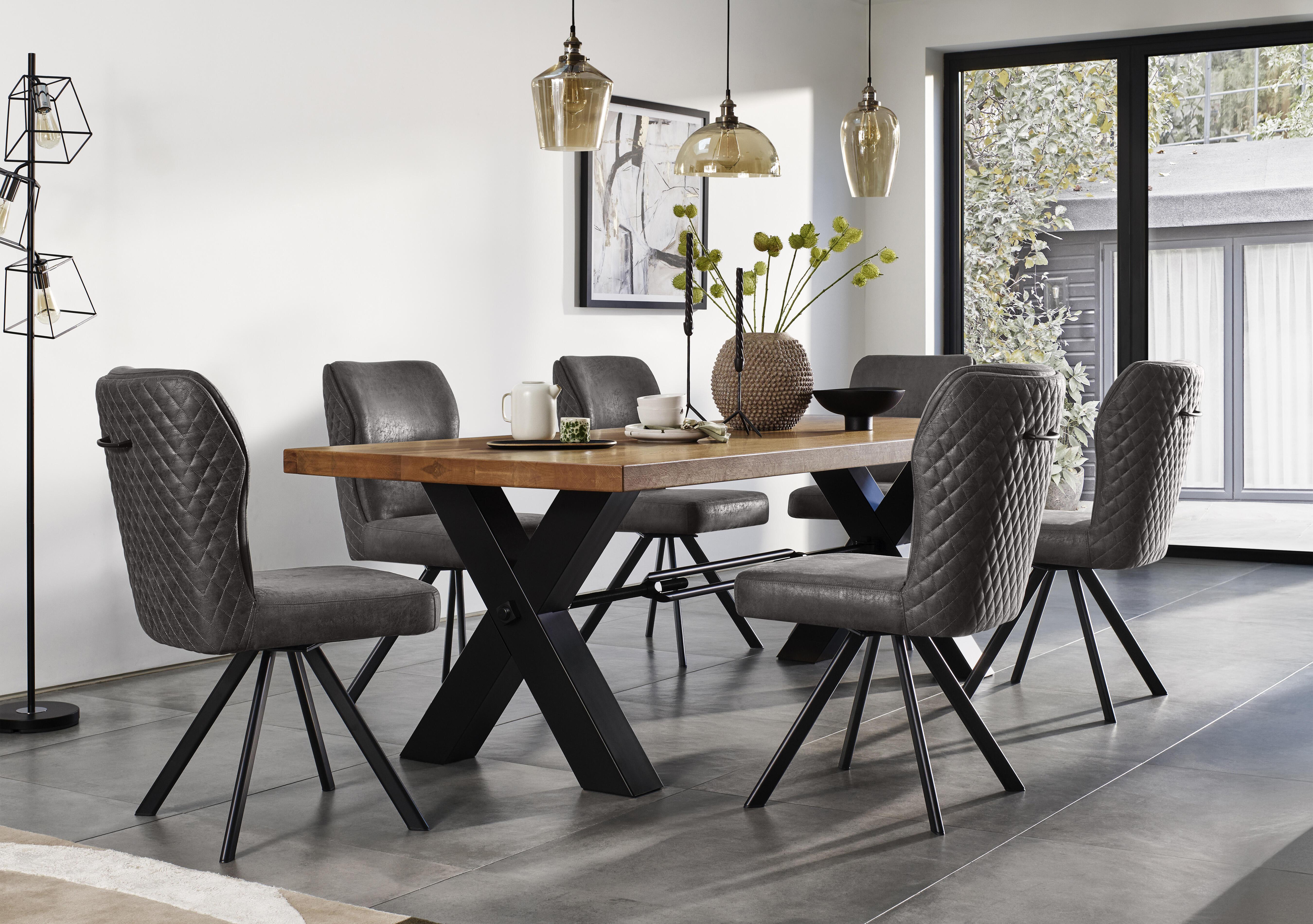 Terra Straight Edge Dining Table with Tension Bolt X-Leg and 6 Steel Fabric Swivel Dining Chairs in  on Furniture Village