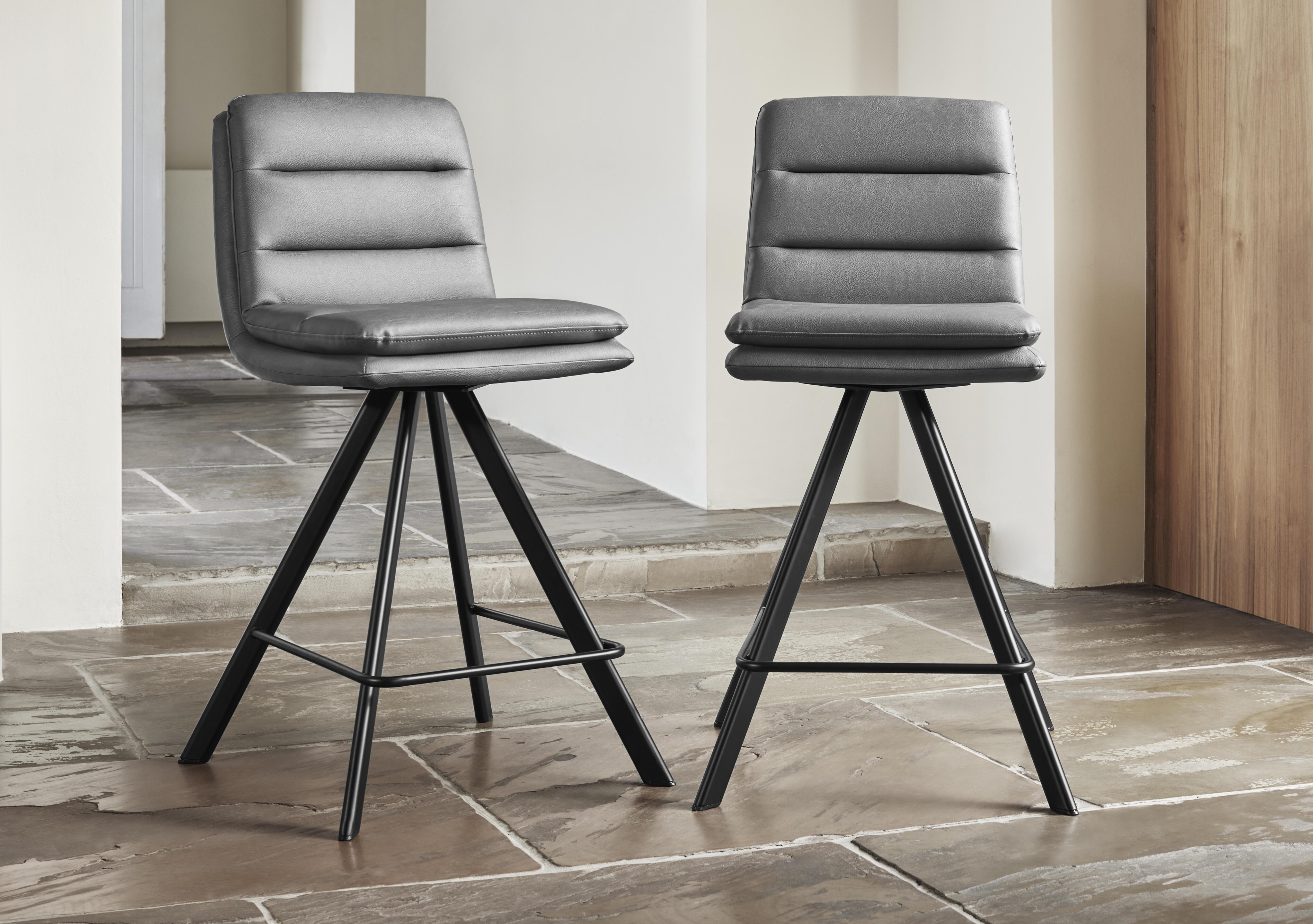Njord Pair of Faux Leather Swivel Bar Stools in  on Furniture Village