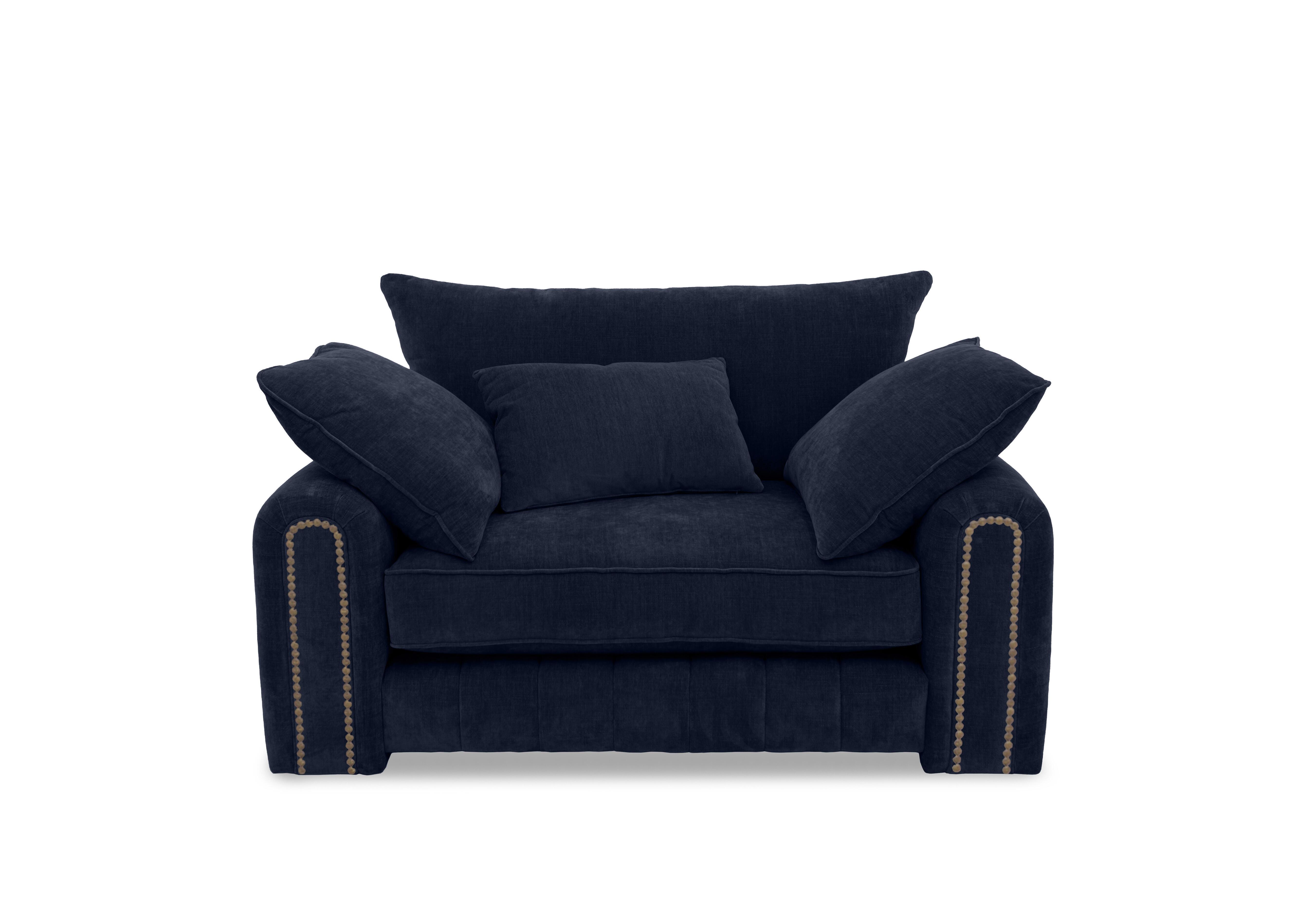 Retreat Snuggler Chair in Aston Navy Studs on Furniture Village