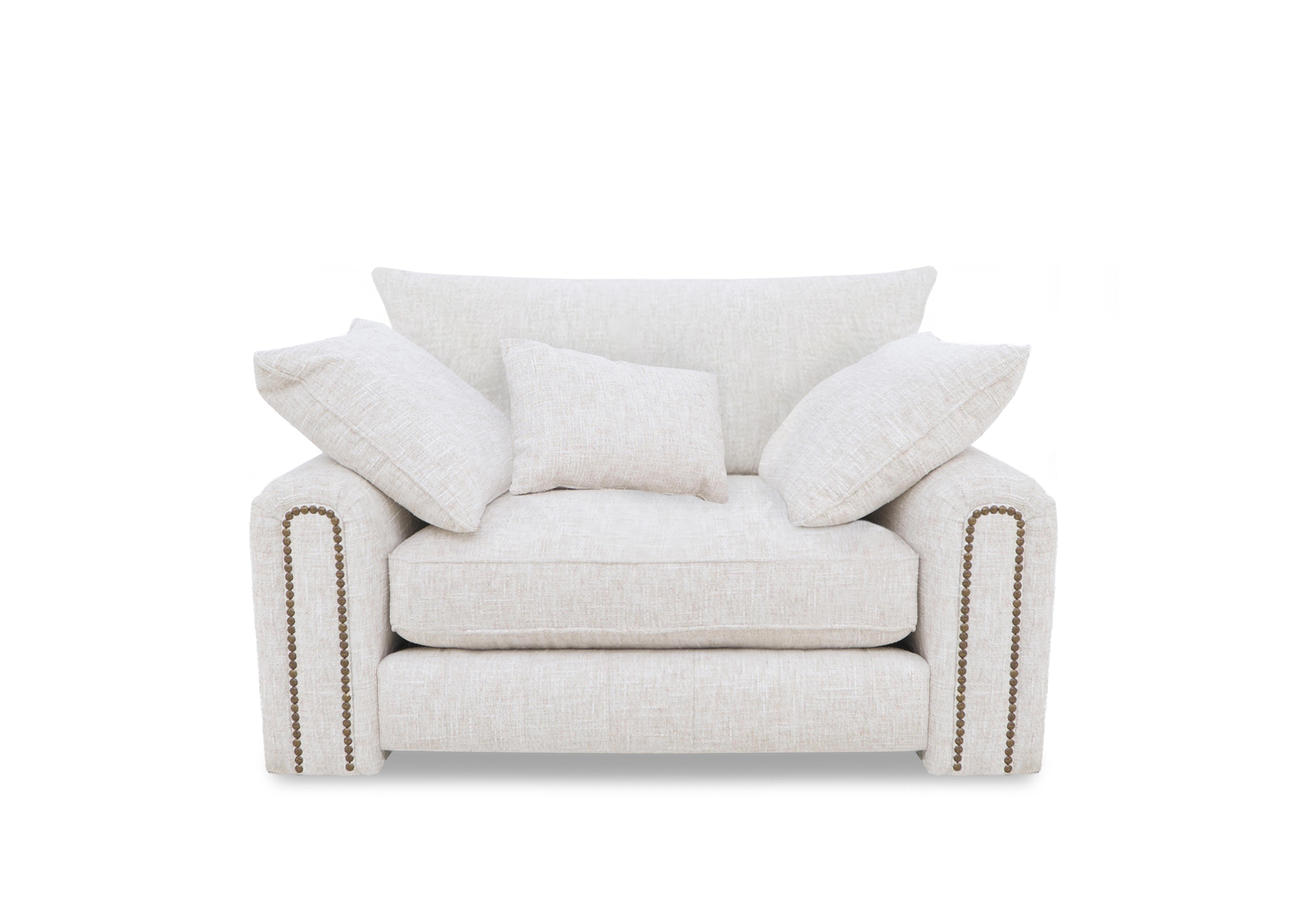 Retreat Snuggler Chair in Odyssey Afterglow Studs on Furniture Village