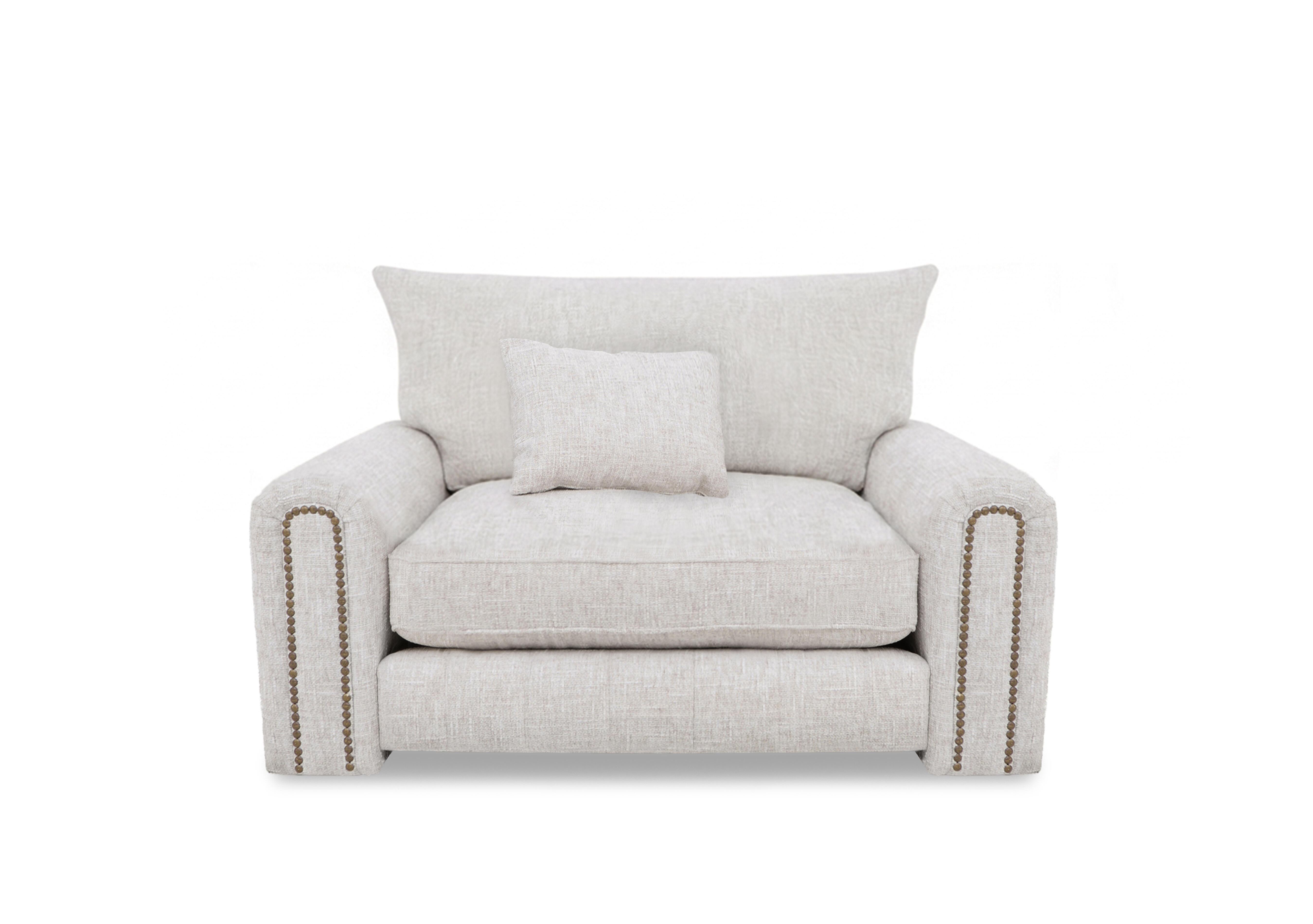 Retreat Snuggler Chair in Odyssey Cosmic Dust Studs on Furniture Village