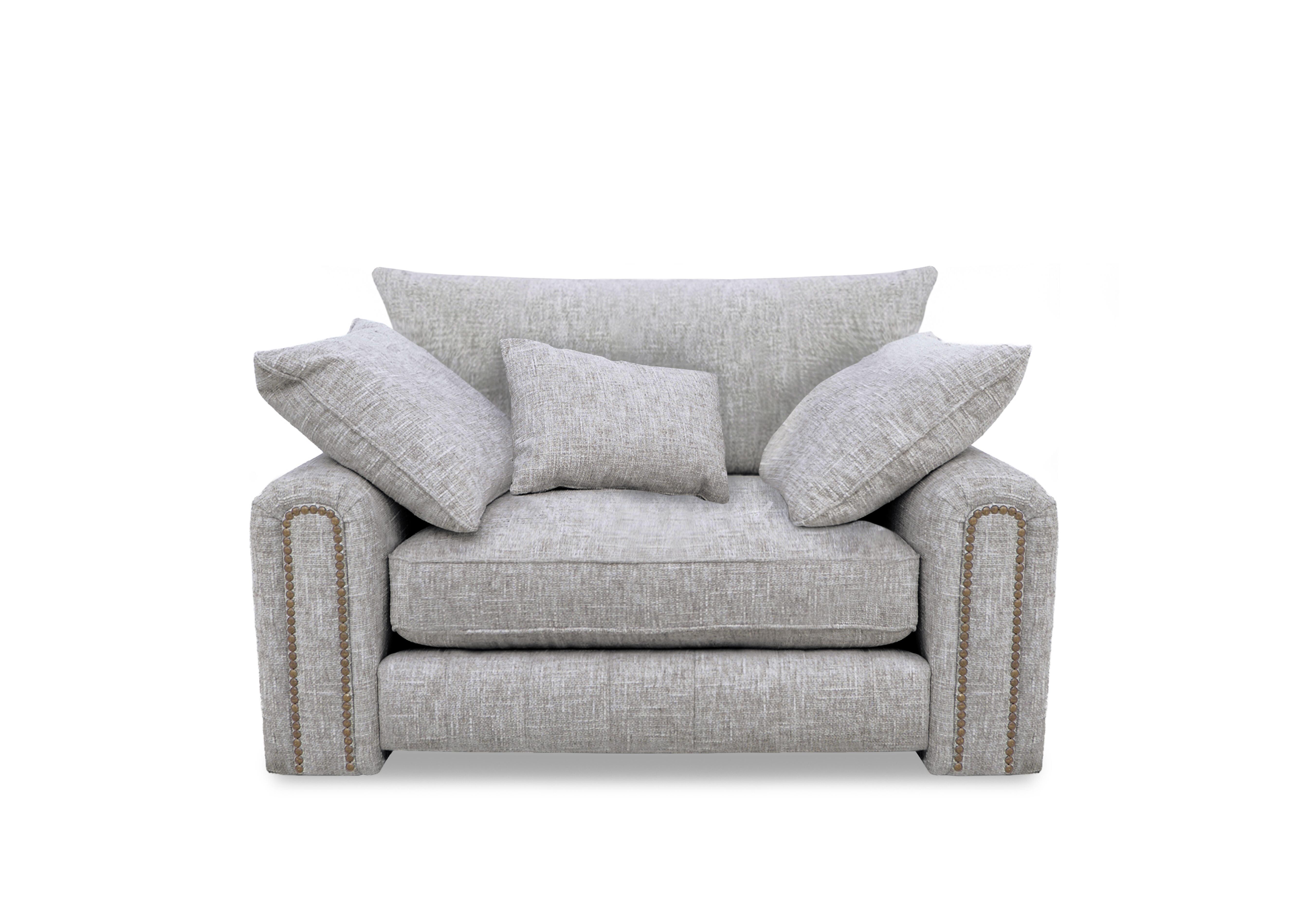 Retreat Snuggler Chair in Odyssey Metropolis Studs on Furniture Village