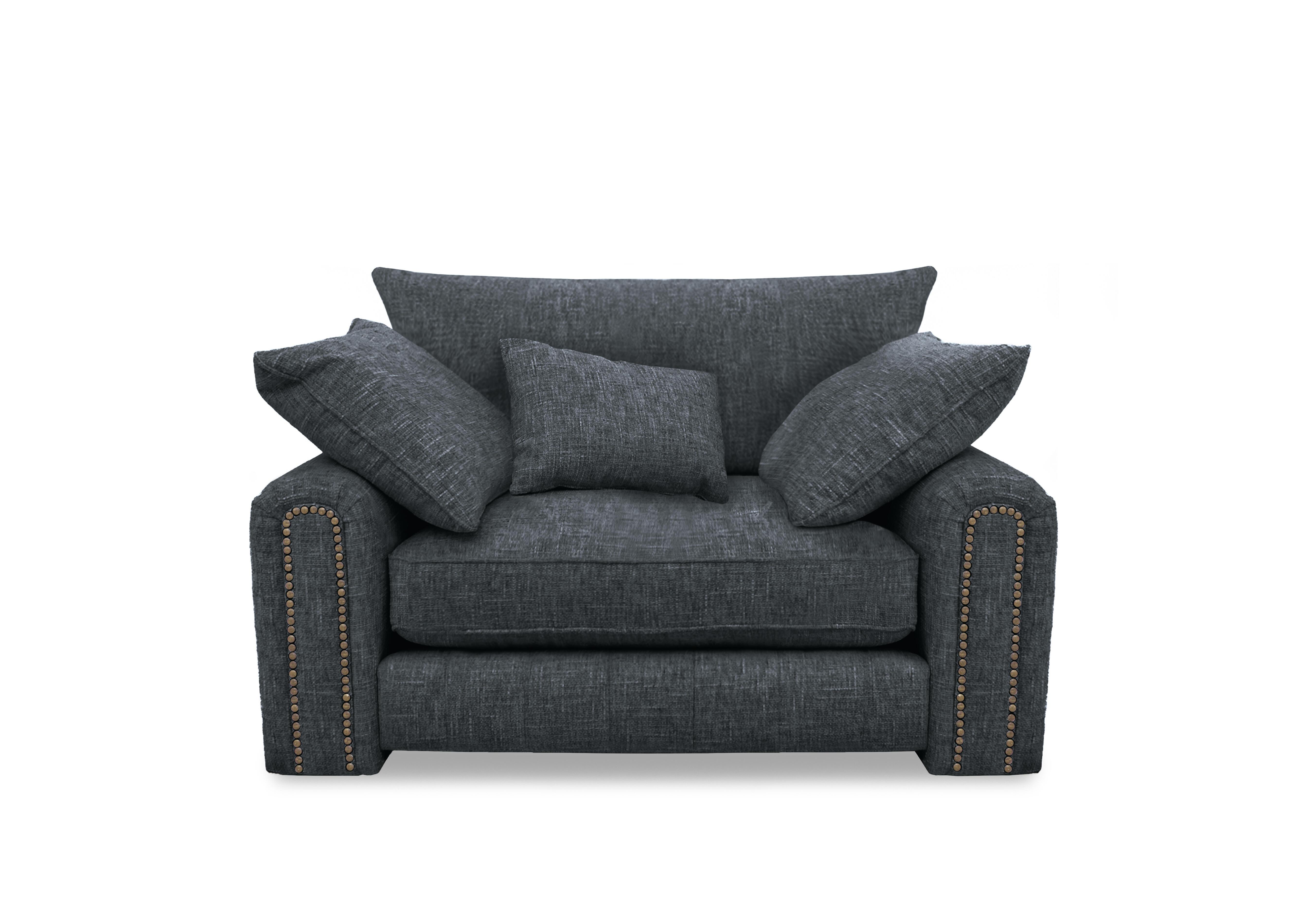 Retreat Snuggler Chair in Odyssey Subzero Studs on Furniture Village