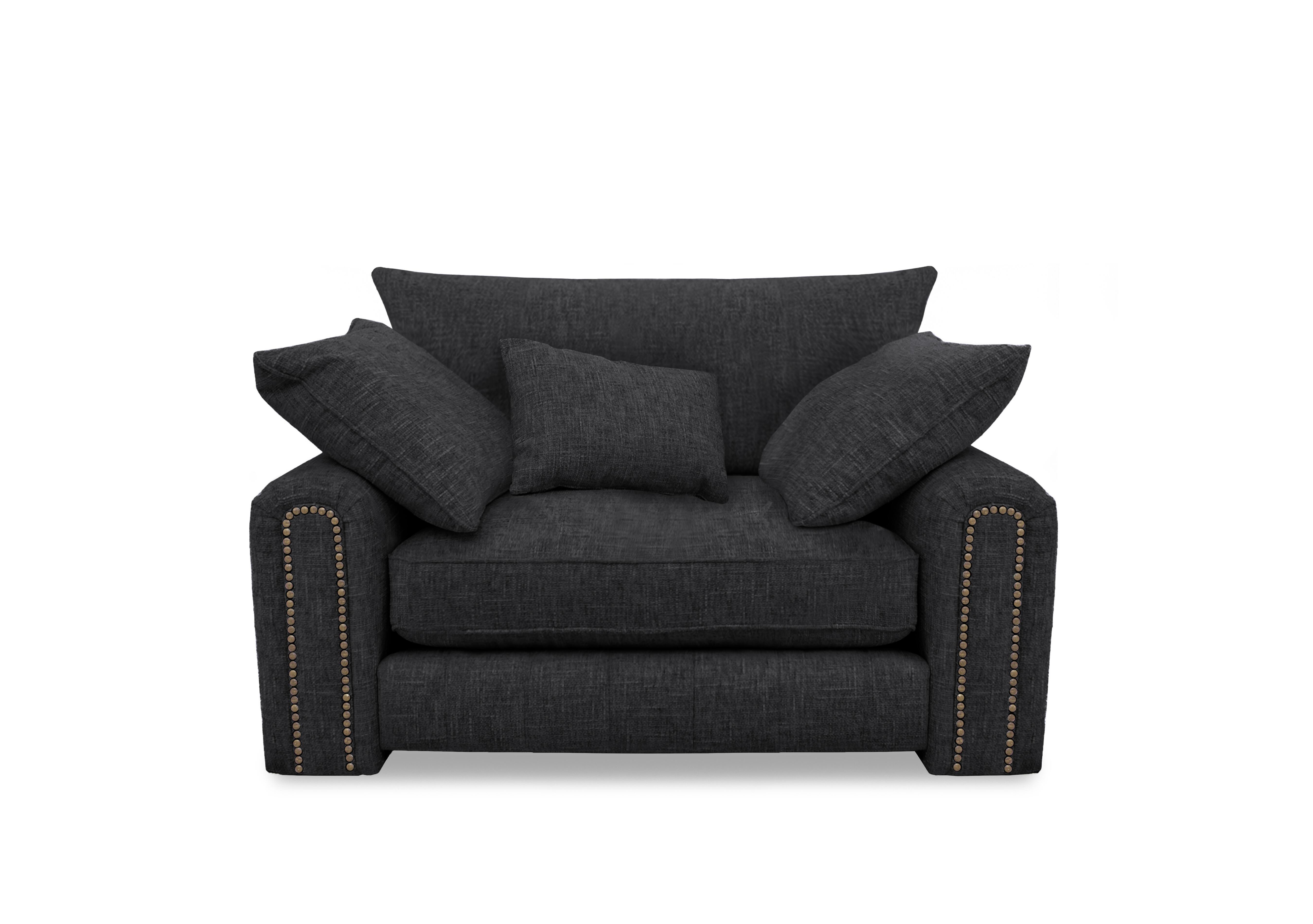 Retreat Snuggler Chair in Odyssey Vortex Studs on Furniture Village