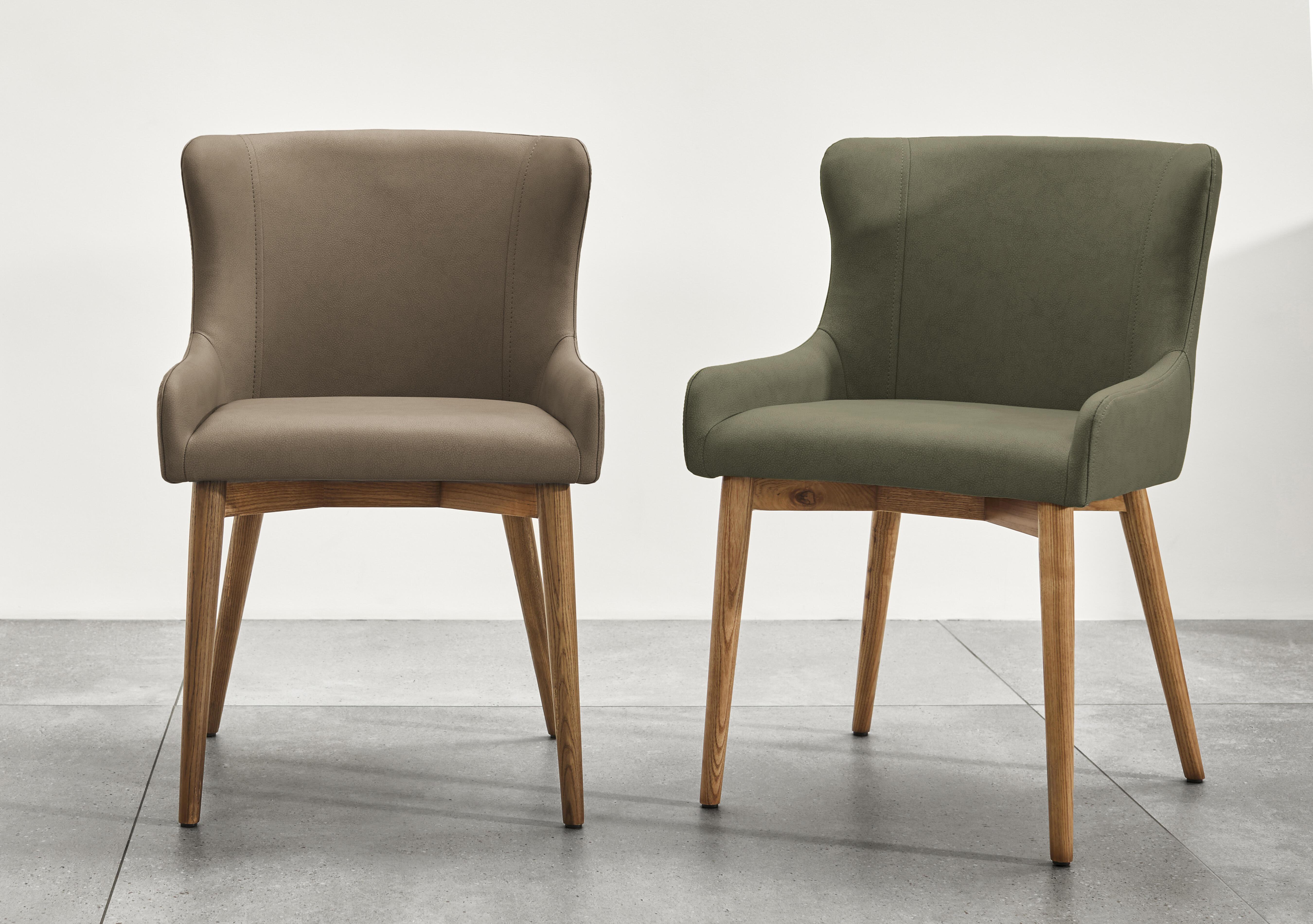 Sansa Pair of Faux Leather Dining Chairs with Wooden Legs in  on Furniture Village