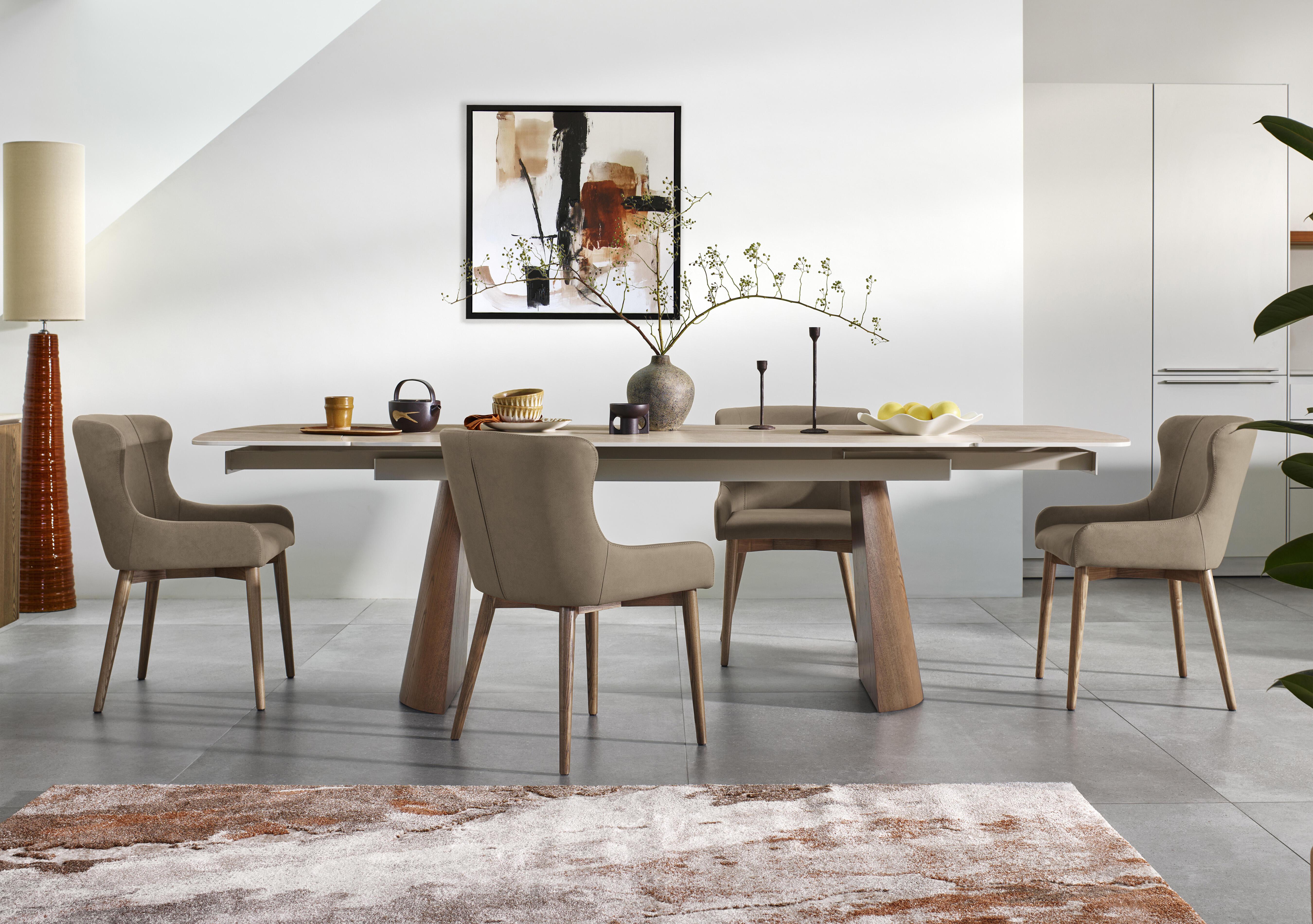Sansa Rectangular Draw Leaf Extending Dining Table and 4 Faux Leather Dining Chairs with Wooden Legs in  on Furniture Village